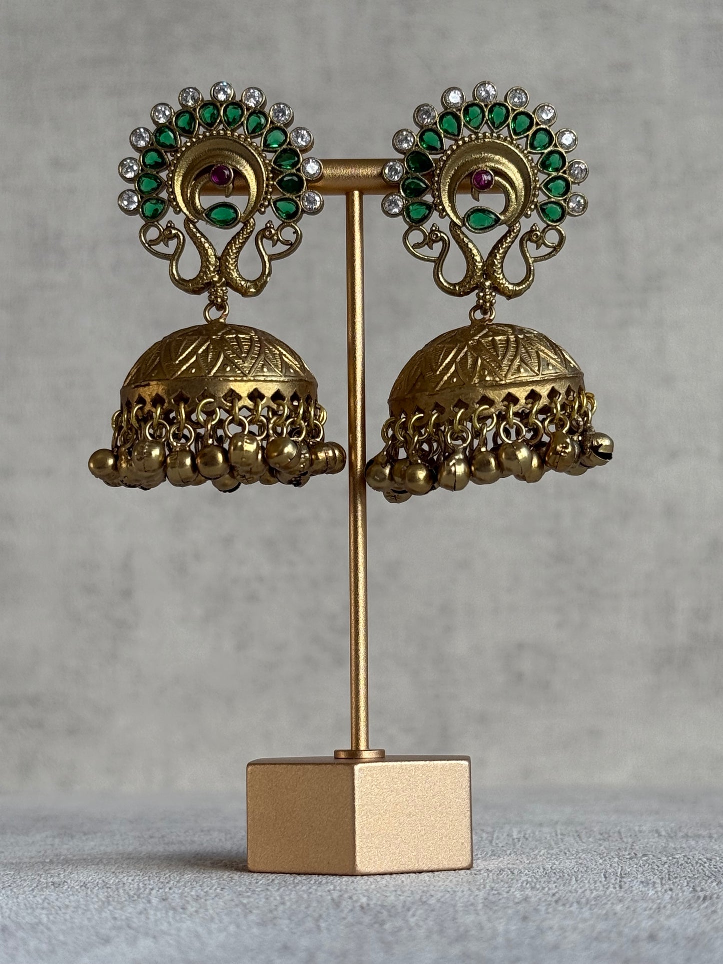 Ayura Designs Moraya Jhumkis – Emerald Green Peacock Motif with Antique Gold Detailing