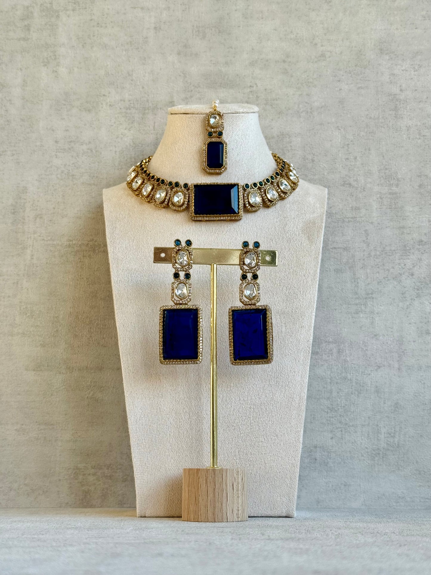 Ayura Designs Clara Set with Earrings & Tikka – Royal Blue Stones with Moissanite and Antique Gold Finish