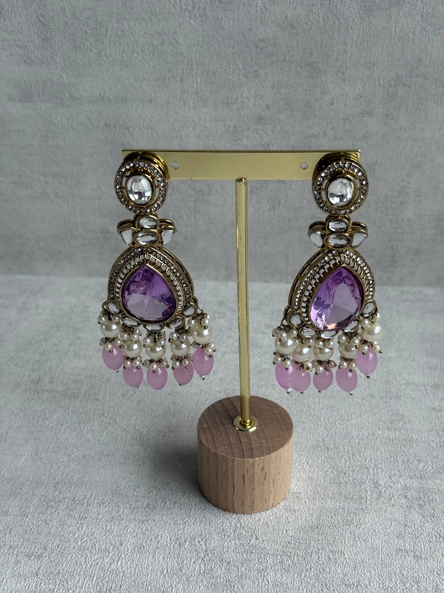 Ayura Designs Nageen Earrings – Antique Gold Jhumkis with Lilac Stones, Mirror-Cut Accents & Pearl Drops