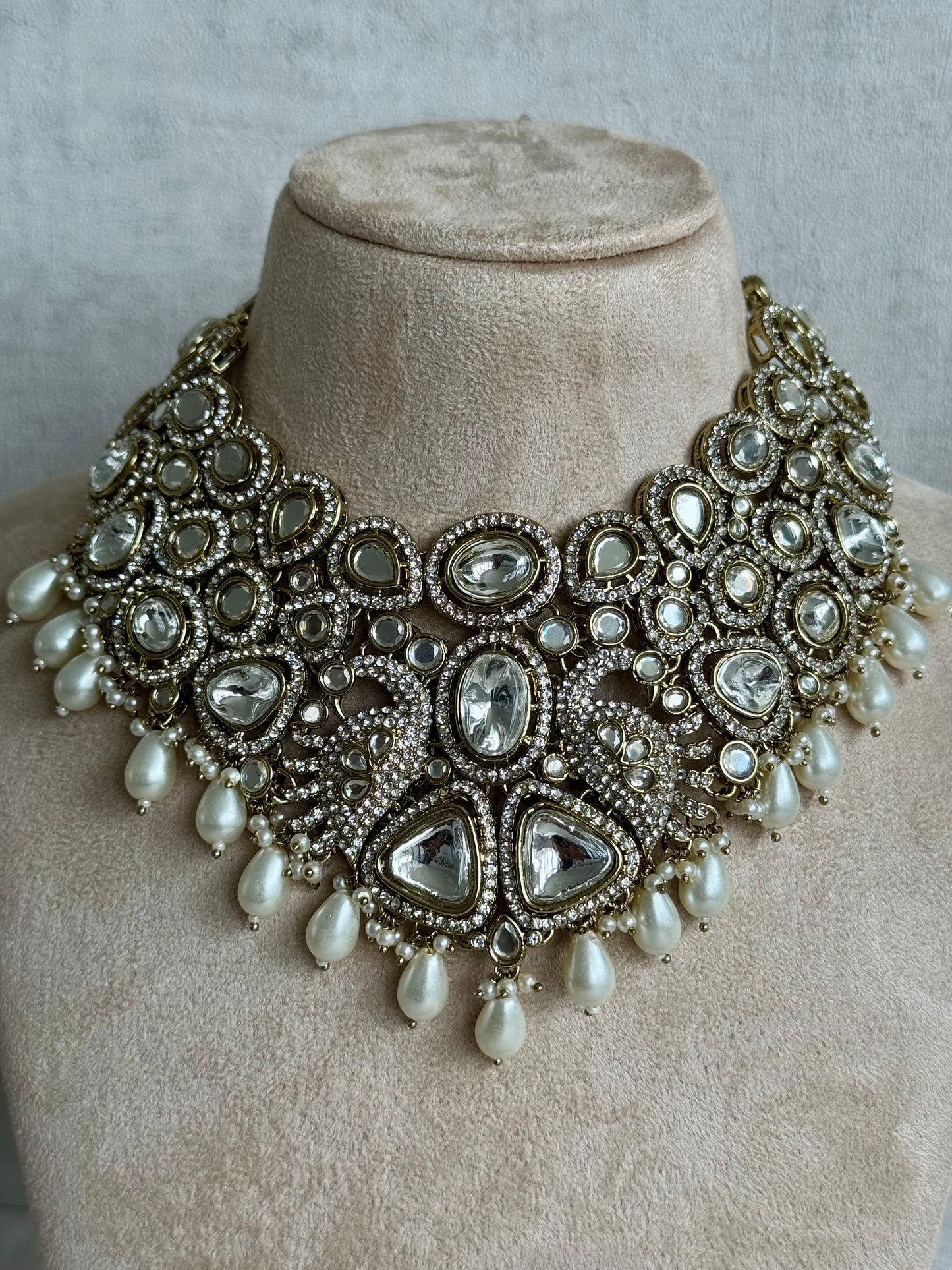 Ayura Designs Tajdar Bridal Set with Necklace, Jhumkis, Tikka, Nath, Ring & Sheeshphool – Jadau Kundan Craftsmanship with Mirror-Cut Polki, Ivory Pearl Drops & Antique Silver-Gold Finish