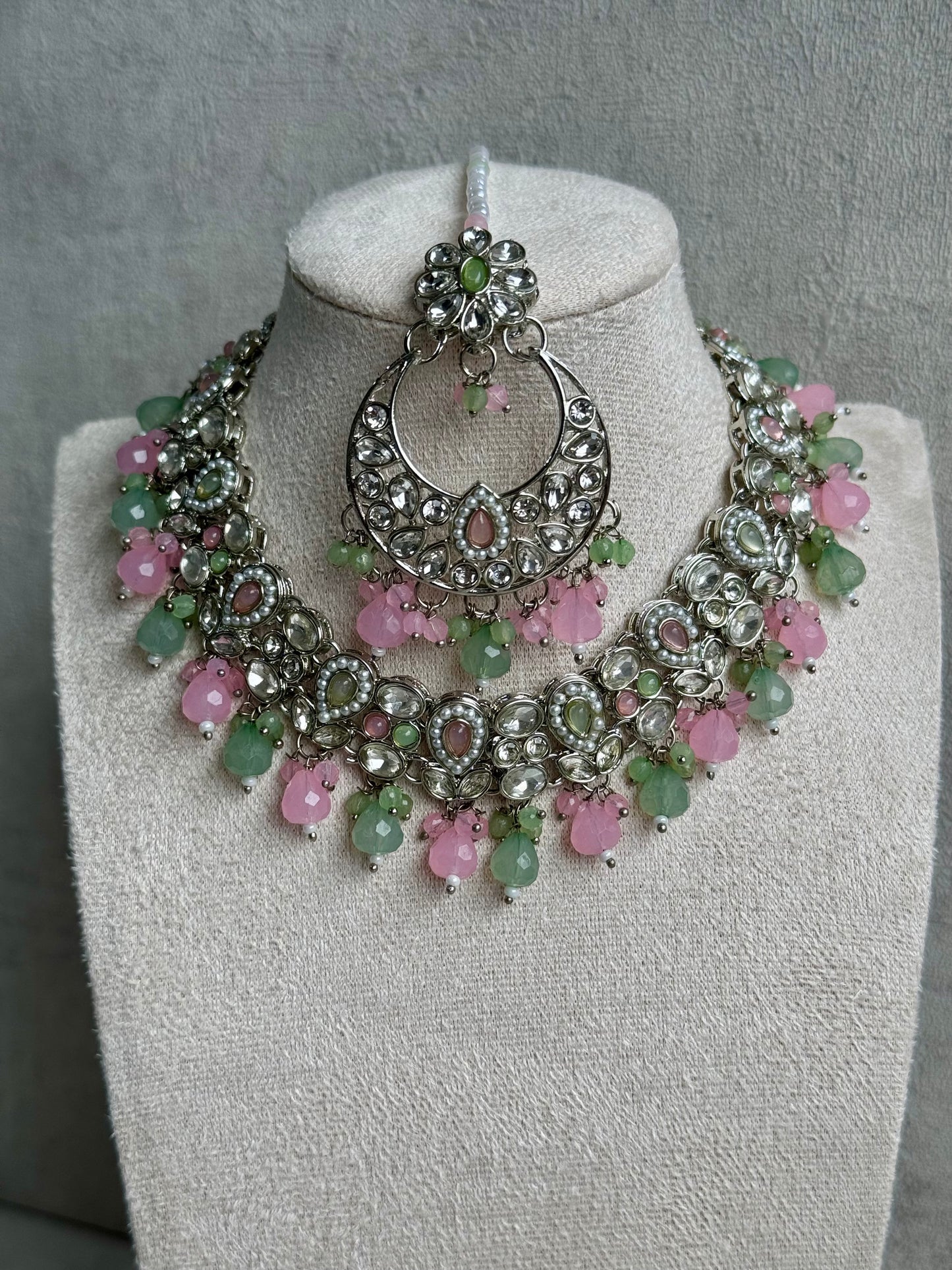 Ayura Designs Sara Set Earrings & Tikka - Exquisite Silver Adornments with Studded Polki Stones & Pink & Green Beads