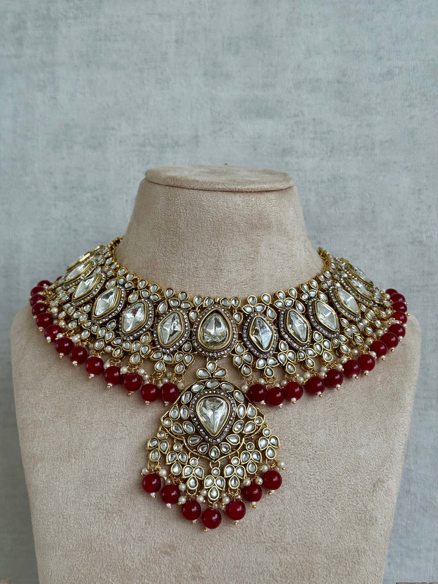 Ayura Designs Gulbahar Bridal Set with Necklace, Jhumkis, Tikka, Nath, Ring & Sheeshphool – Jadau Kundan Craftsmanship with Mirror-Cut Polki, Red Beads & Antique Gold Finish