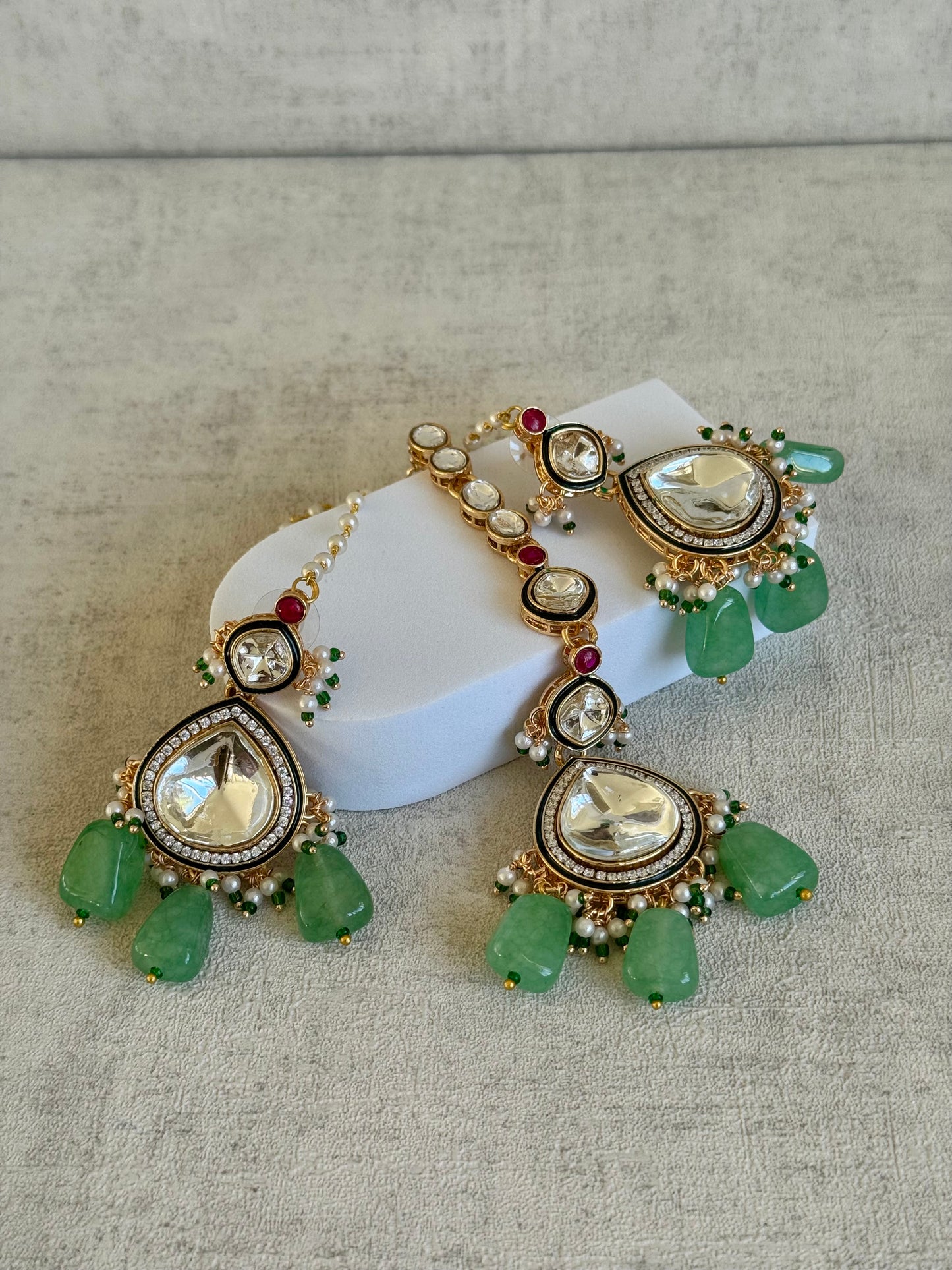 Ayura Designs Malika Bridal Set with Necklace, Jhumkis, Tikka, Nath, Ring & Sheeshphool – Jadau Kundan Craftsmanship with Mirror-Cut Polki, Jade-Toned Drops, Ruby Accents & Antique Gold Finish