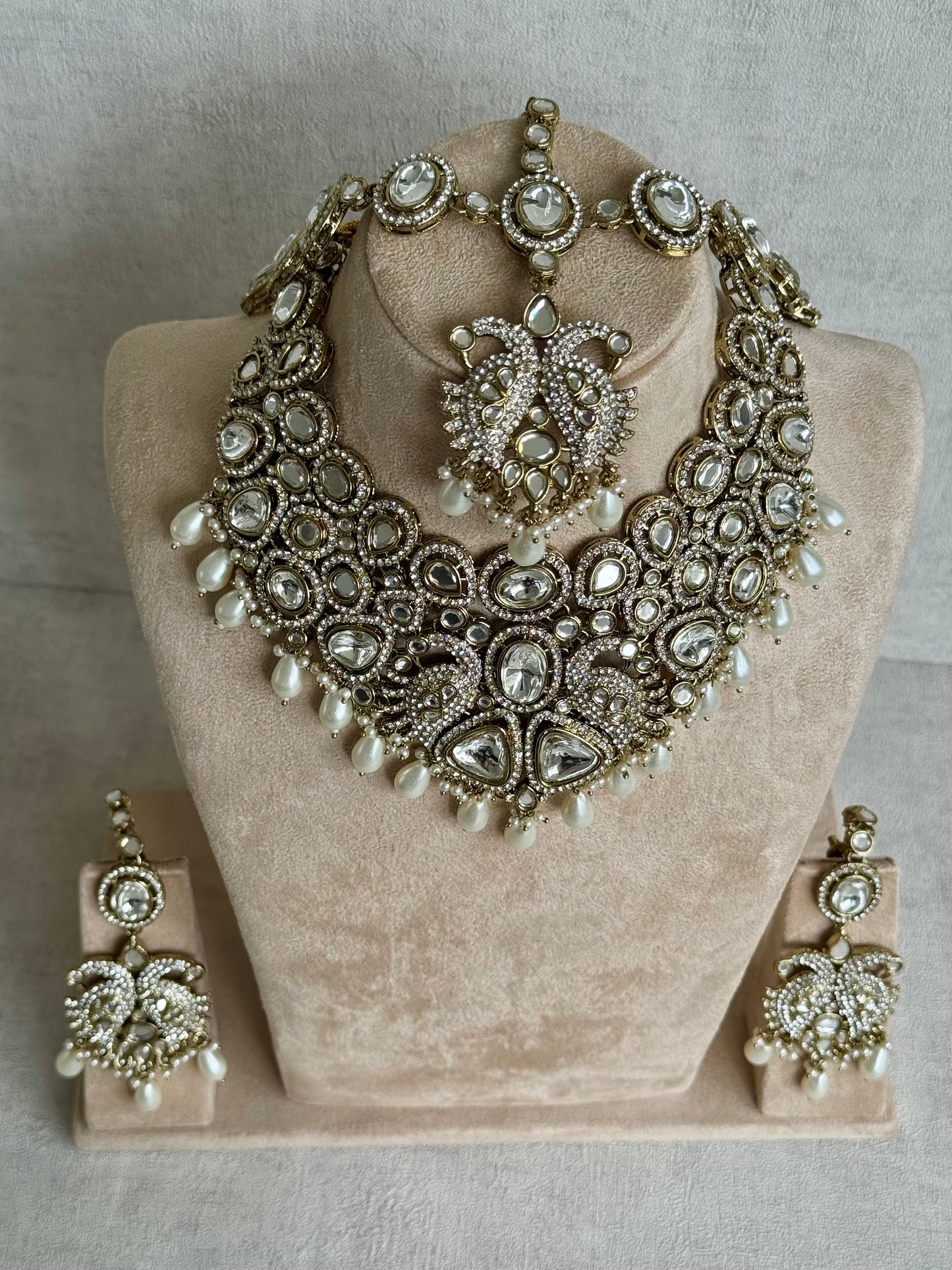 Ayura Designs Tajdar Bridal Set with Necklace, Jhumkis, Tikka, Nath, Ring & Sheeshphool – Jadau Kundan Craftsmanship with Mirror-Cut Polki, Ivory Pearl Drops & Antique Silver-Gold Finish