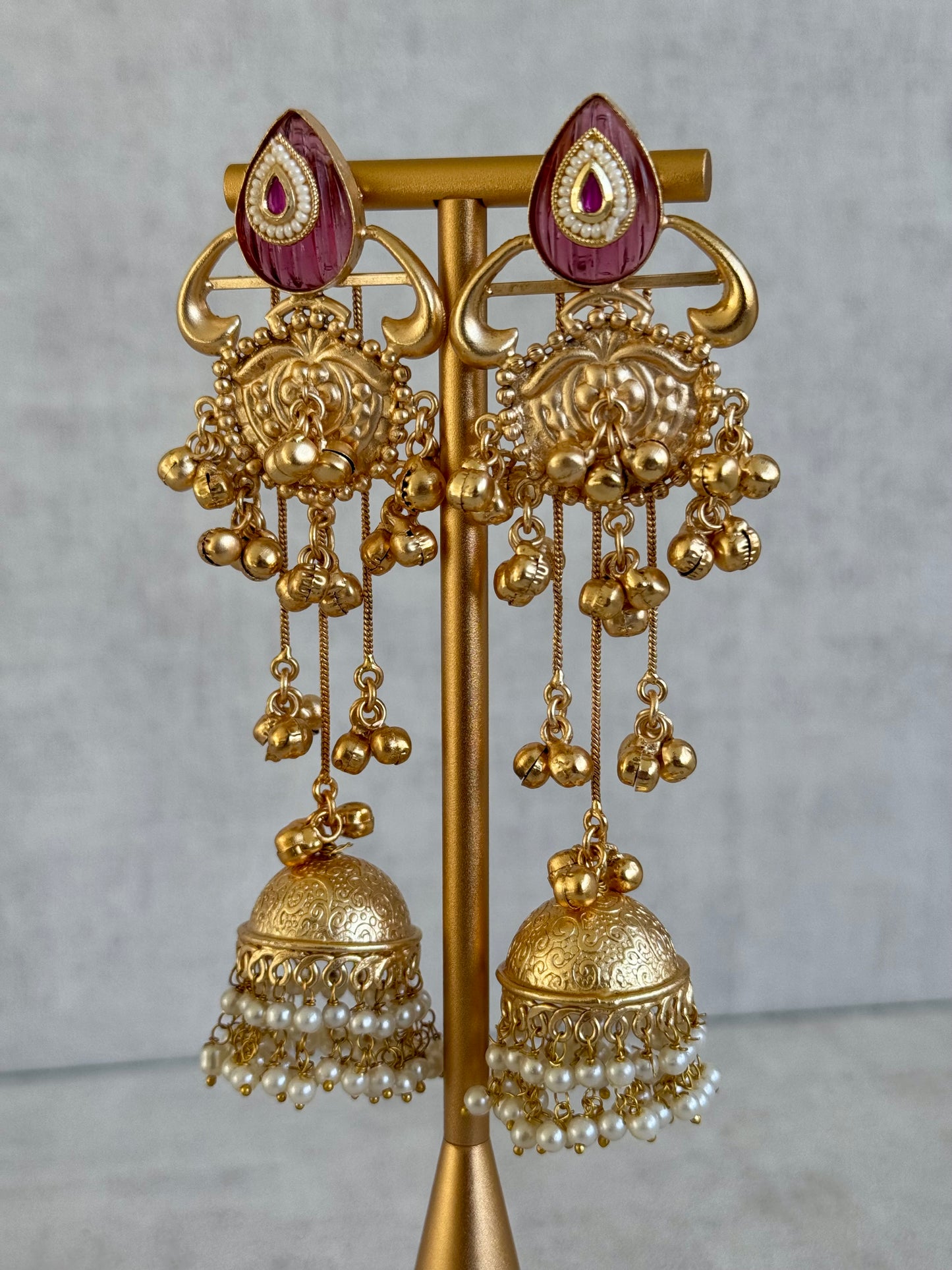 Ayura Designs Prisha Earrings – Antique Gold Jhumkas with Ruby Red Studs, Pearl Detailing & Long Dangling Chains