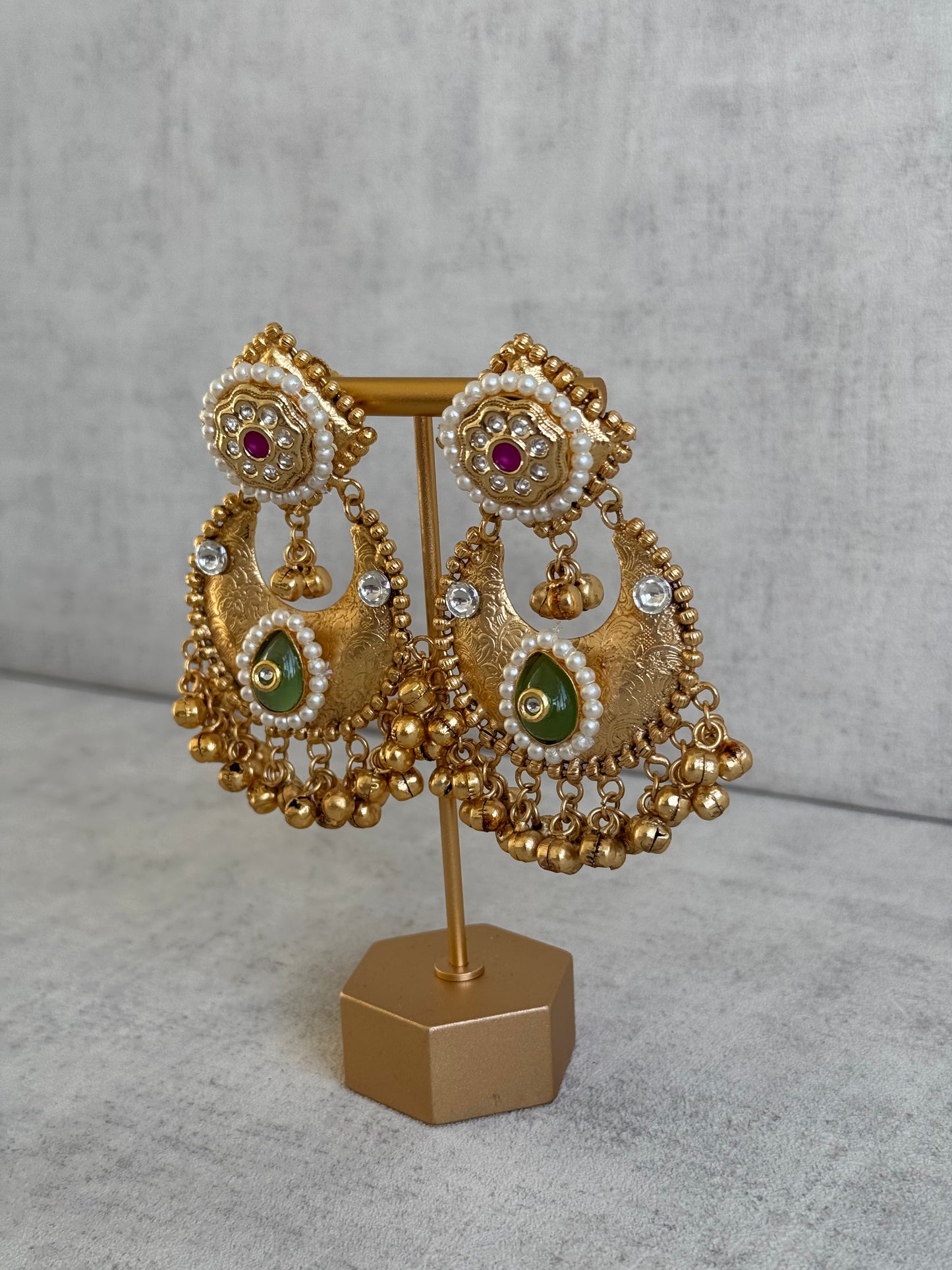 Ayura Designs Naaz Earrings – Antique Gold Jhumkas with Green Teardrop Stone, Pearl Embellishments & Ghungroo Detailing