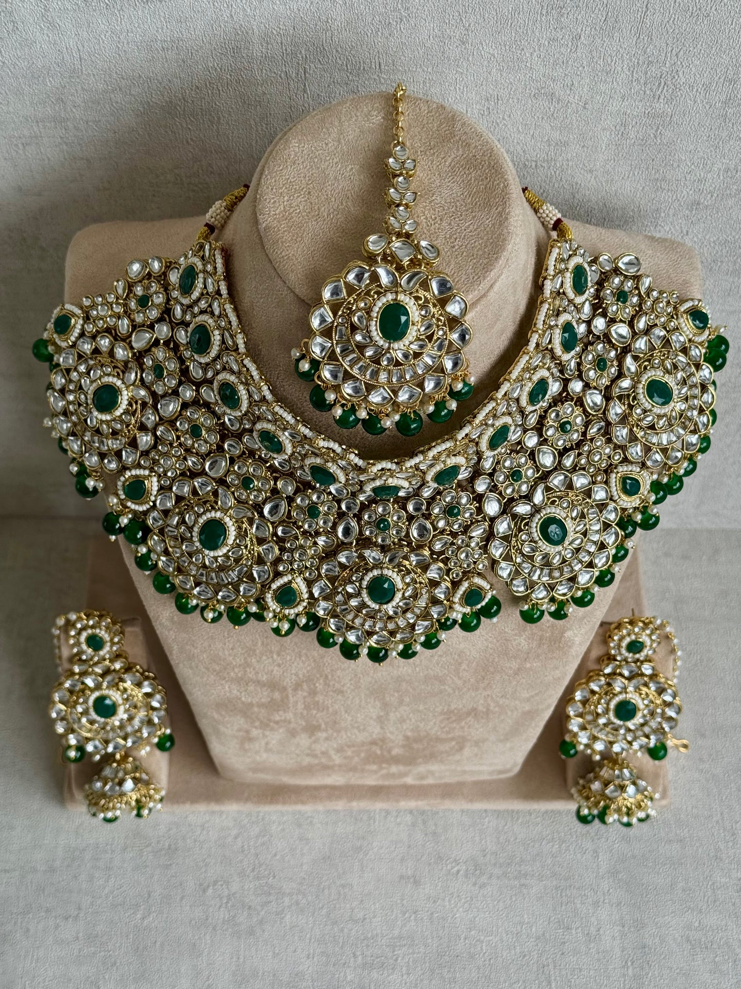Ayura Designs Meherbano Bridal Set with Necklace, Jhumkis, Tikka, Nath, Ring & Sheeshphool – Jadau Kundan Craftsmanship with Mirror-Cut Polki, Emerald Green Stones & Antique Gold Finish