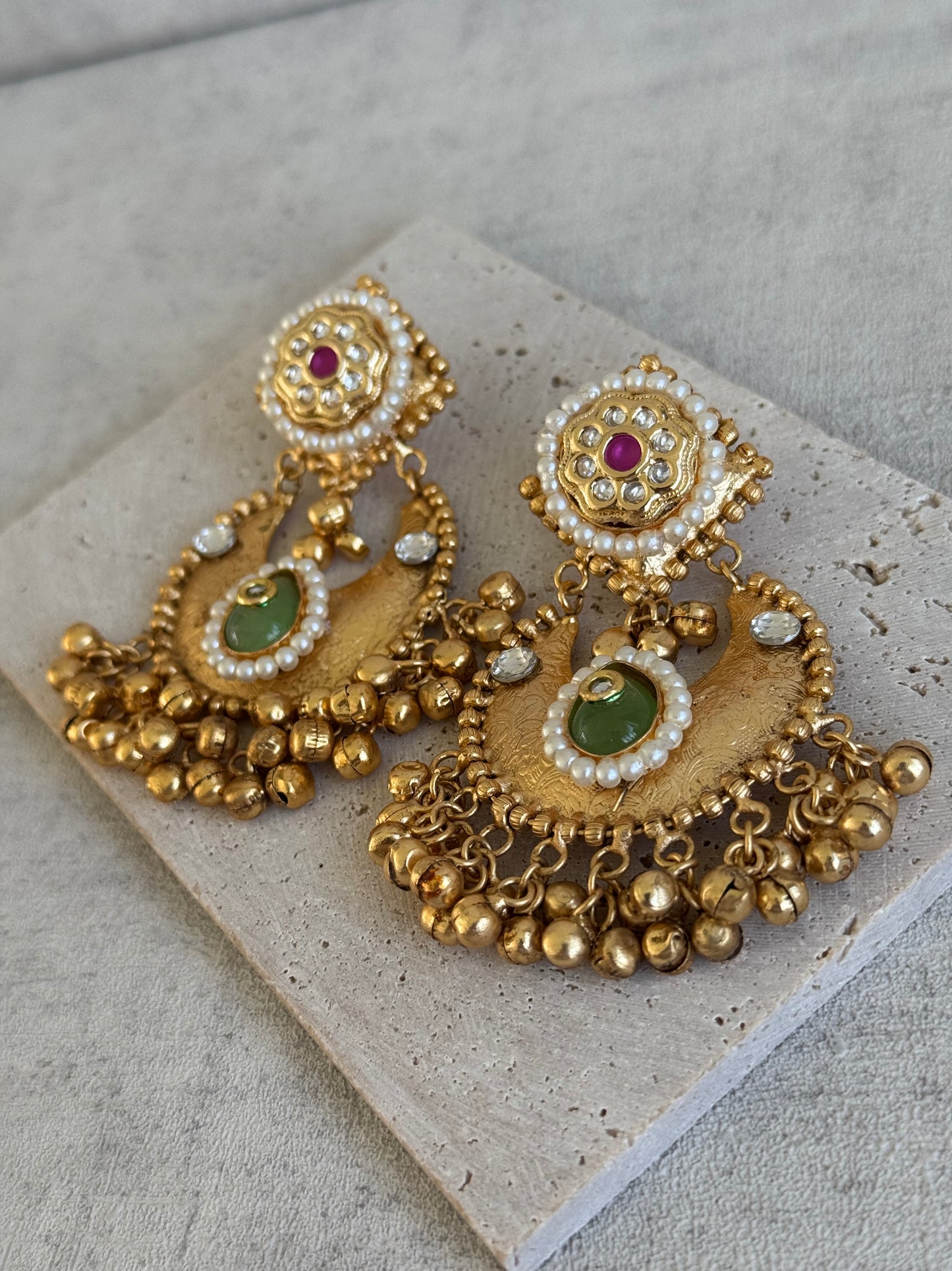 Ayura Designs Naaz Earrings – Antique Gold Jhumkas with Green Teardrop Stone, Pearl Embellishments & Ghungroo Detailing