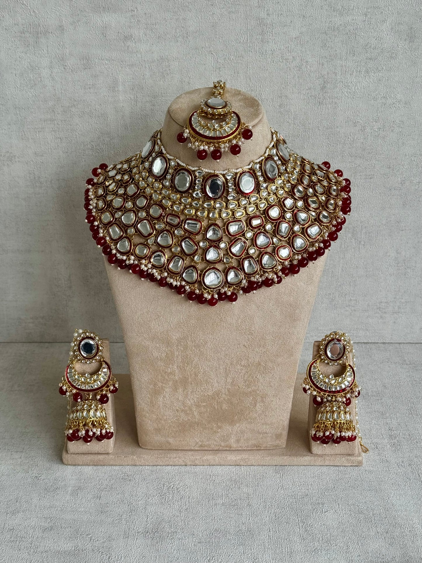 Ayura Designs Gulbadan Bridal Set with Necklace, Jhumkis, Tikka, Nath, Ring & Sheeshphool – Jadau Kundan Craftsmanship with Mirror-Cut Polki, Ruby Red Stones & Antique Gold Finish