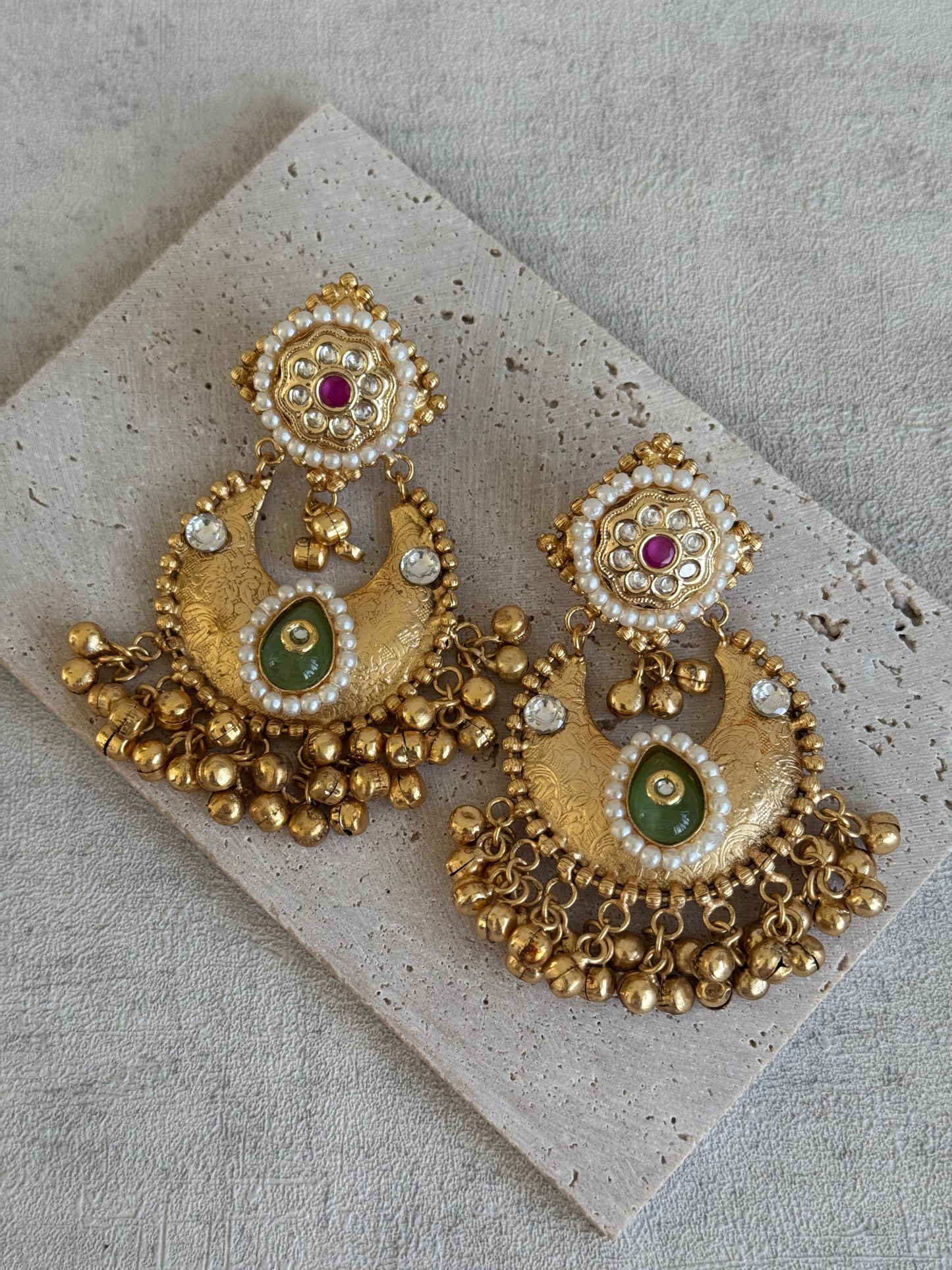 Ayura Designs Naaz Earrings – Antique Gold Jhumkas with Green Teardrop Stone, Pearl Embellishments & Ghungroo Detailing