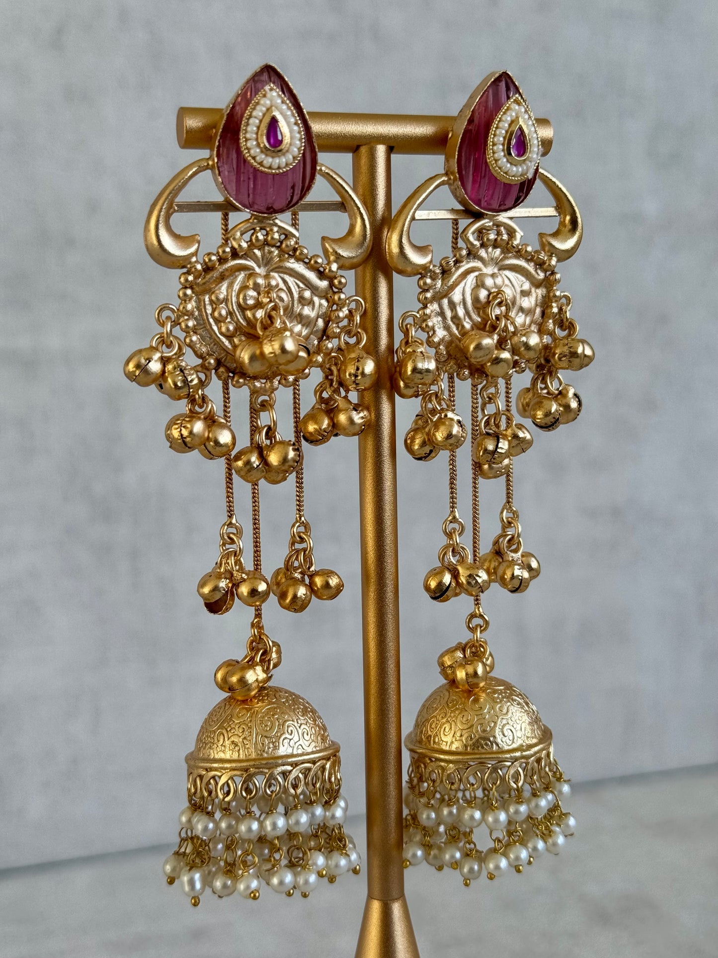 Ayura Designs Prisha Earrings – Antique Gold Jhumkas with Ruby Red Studs, Pearl Detailing & Long Dangling Chains