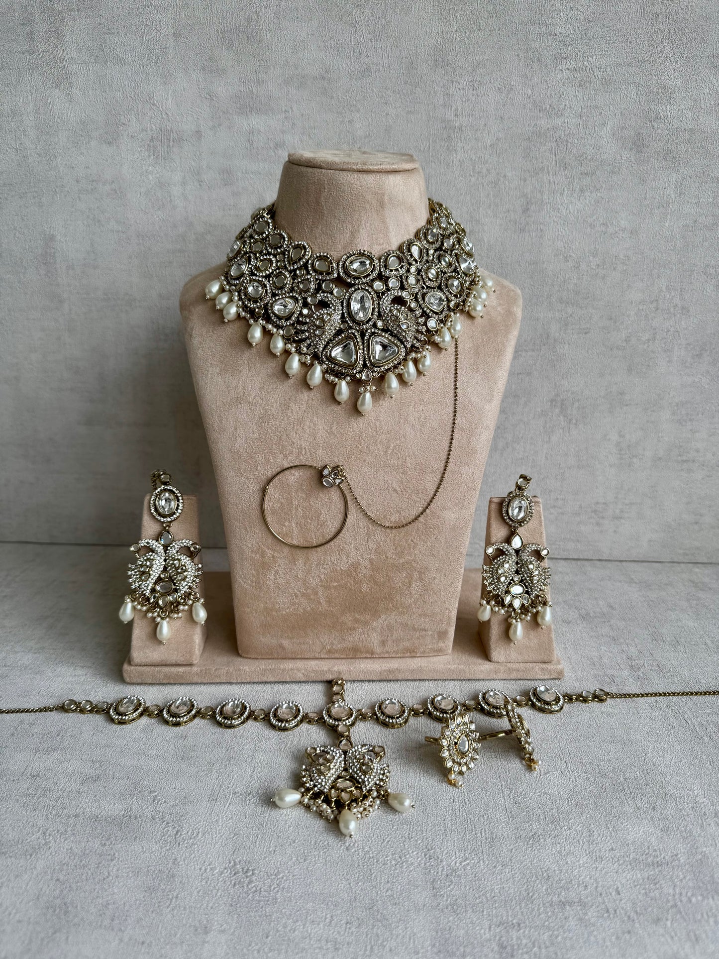 Ayura Designs Tajdar Bridal Set with Necklace, Jhumkis, Tikka, Nath, Ring & Sheeshphool – Jadau Kundan Craftsmanship with Mirror-Cut Polki, Ivory Pearl Drops & Antique Silver-Gold Finish