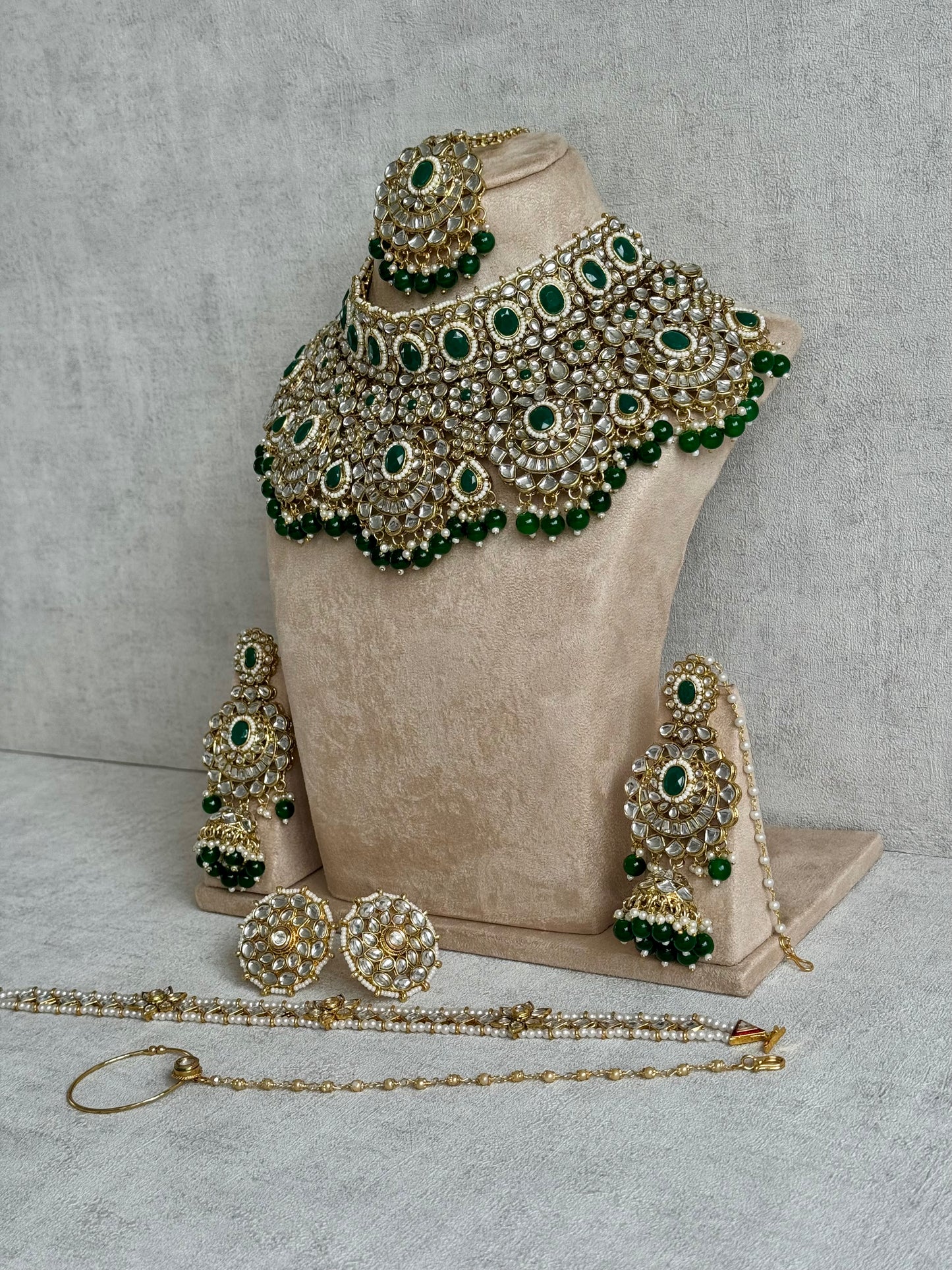 Ayura Designs Meherbano Bridal Set with Necklace, Jhumkis, Tikka, Nath, Ring & Sheeshphool – Jadau Kundan Craftsmanship with Mirror-Cut Polki, Emerald Green Stones & Antique Gold Finish