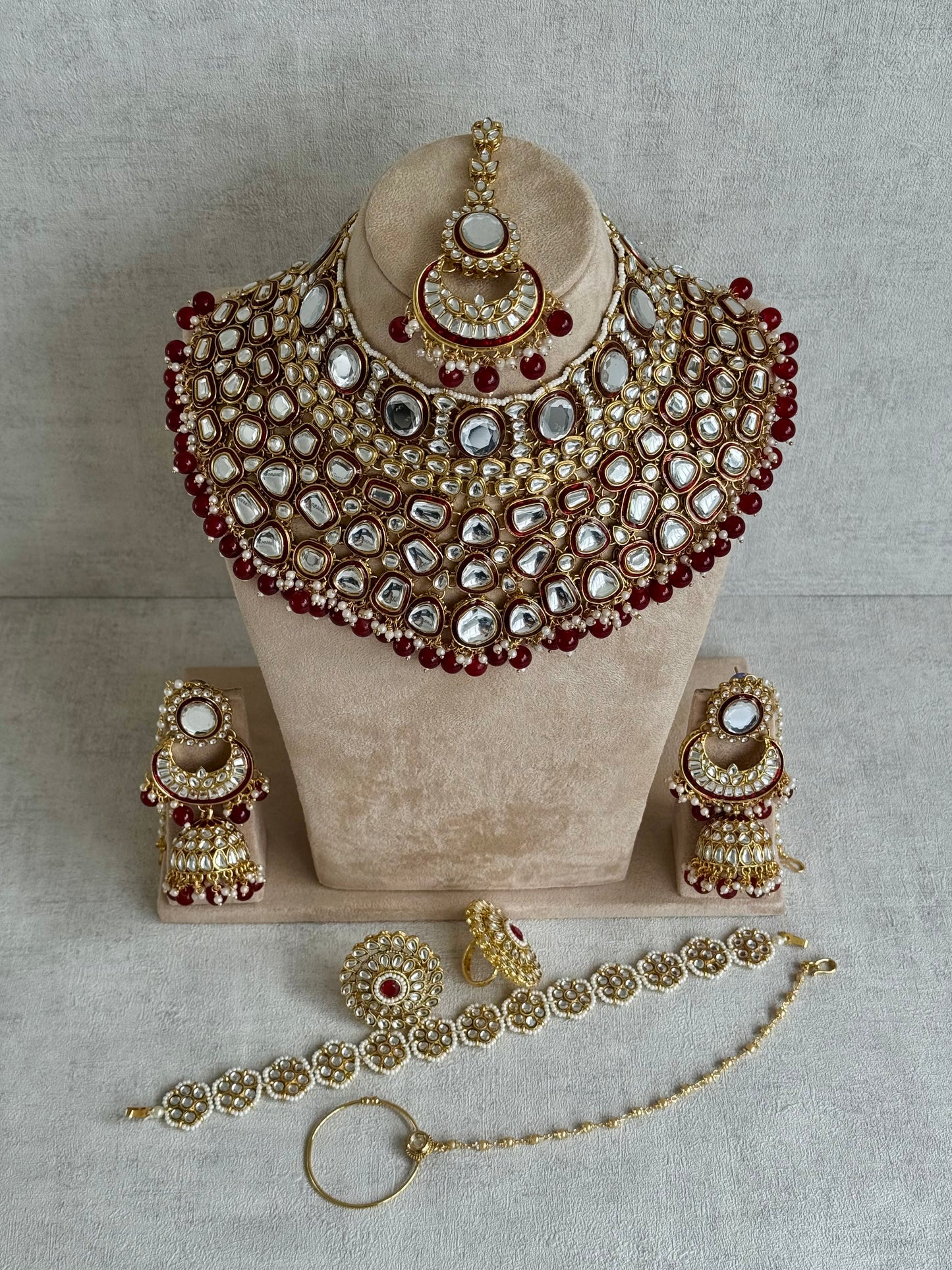 Ayura Designs Gulbadan Bridal Set with Necklace, Jhumkis, Tikka, Nath, Ring & Sheeshphool – Jadau Kundan Craftsmanship with Mirror-Cut Polki, Ruby Red Stones & Antique Gold Finish