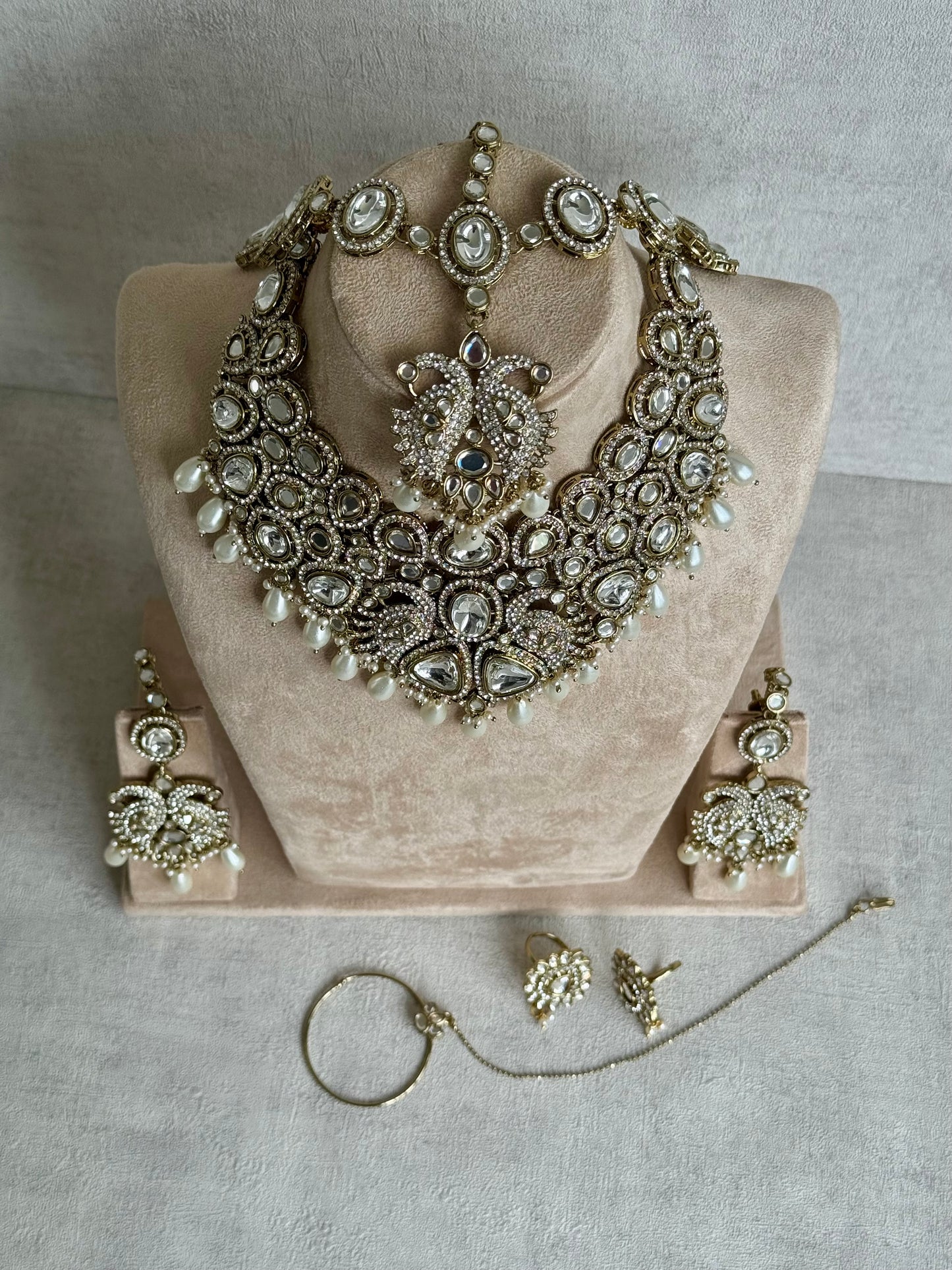 Ayura Designs Tajdar Bridal Set with Necklace, Jhumkis, Tikka, Nath, Ring & Sheeshphool – Jadau Kundan Craftsmanship with Mirror-Cut Polki, Ivory Pearl Drops & Antique Silver-Gold Finish