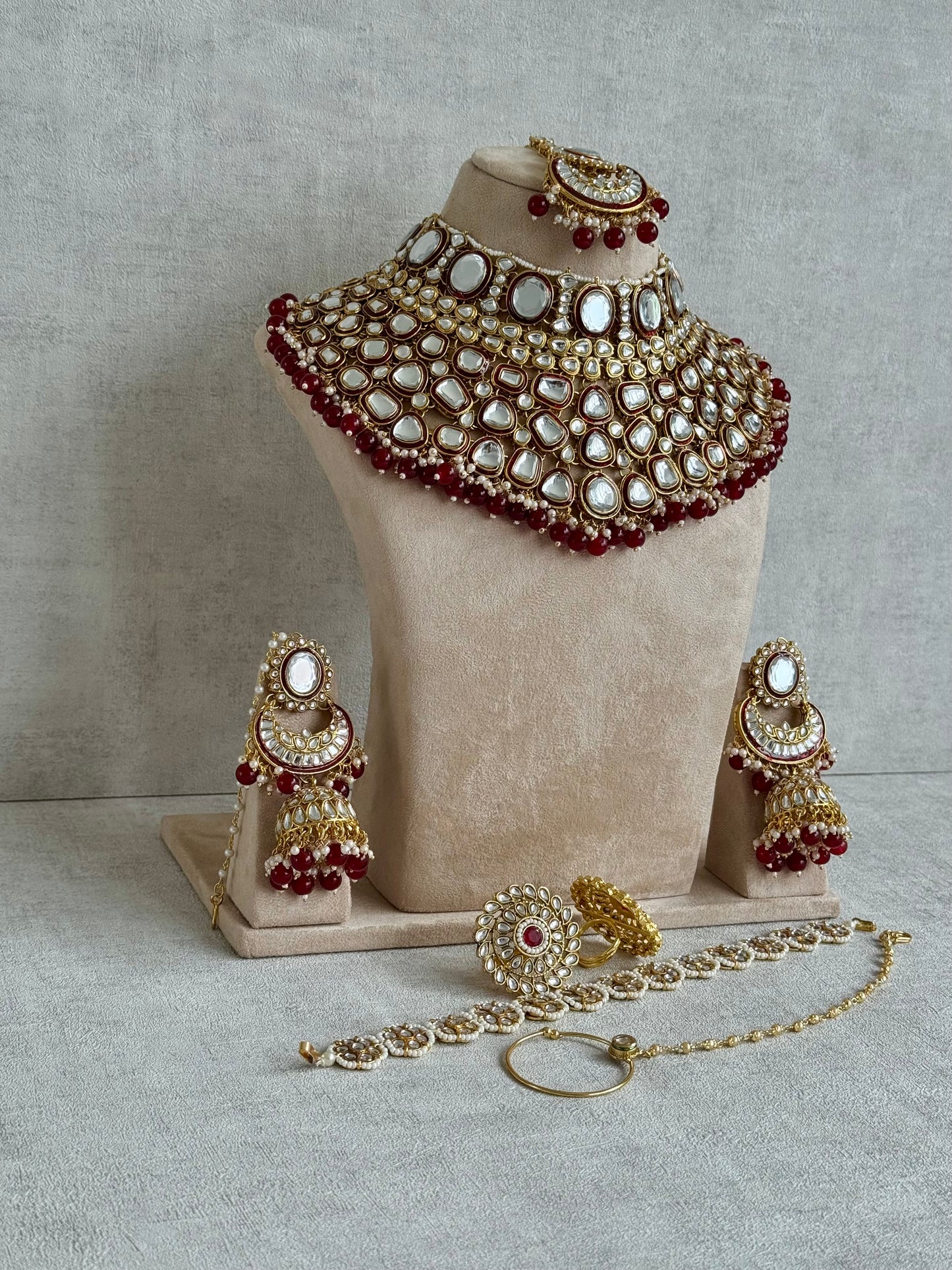Ayura Designs Gulbadan Bridal Set with Necklace, Jhumkis, Tikka, Nath, Ring & Sheeshphool – Jadau Kundan Craftsmanship with Mirror-Cut Polki, Ruby Red Stones & Antique Gold Finish