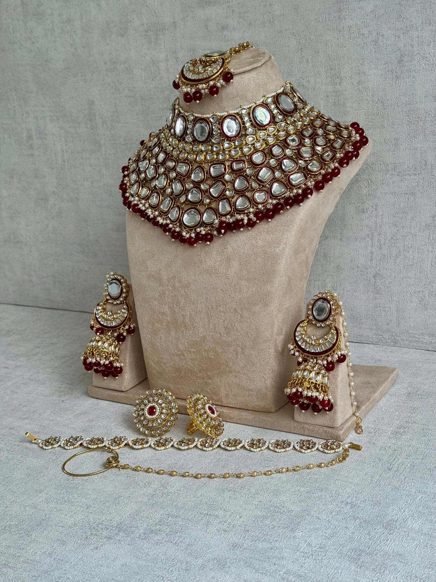 Ayura Designs Gulbadan Bridal Set with Necklace, Jhumkis, Tikka, Nath, Ring & Sheeshphool – Jadau Kundan Craftsmanship with Mirror-Cut Polki, Ruby Red Stones & Antique Gold Finish