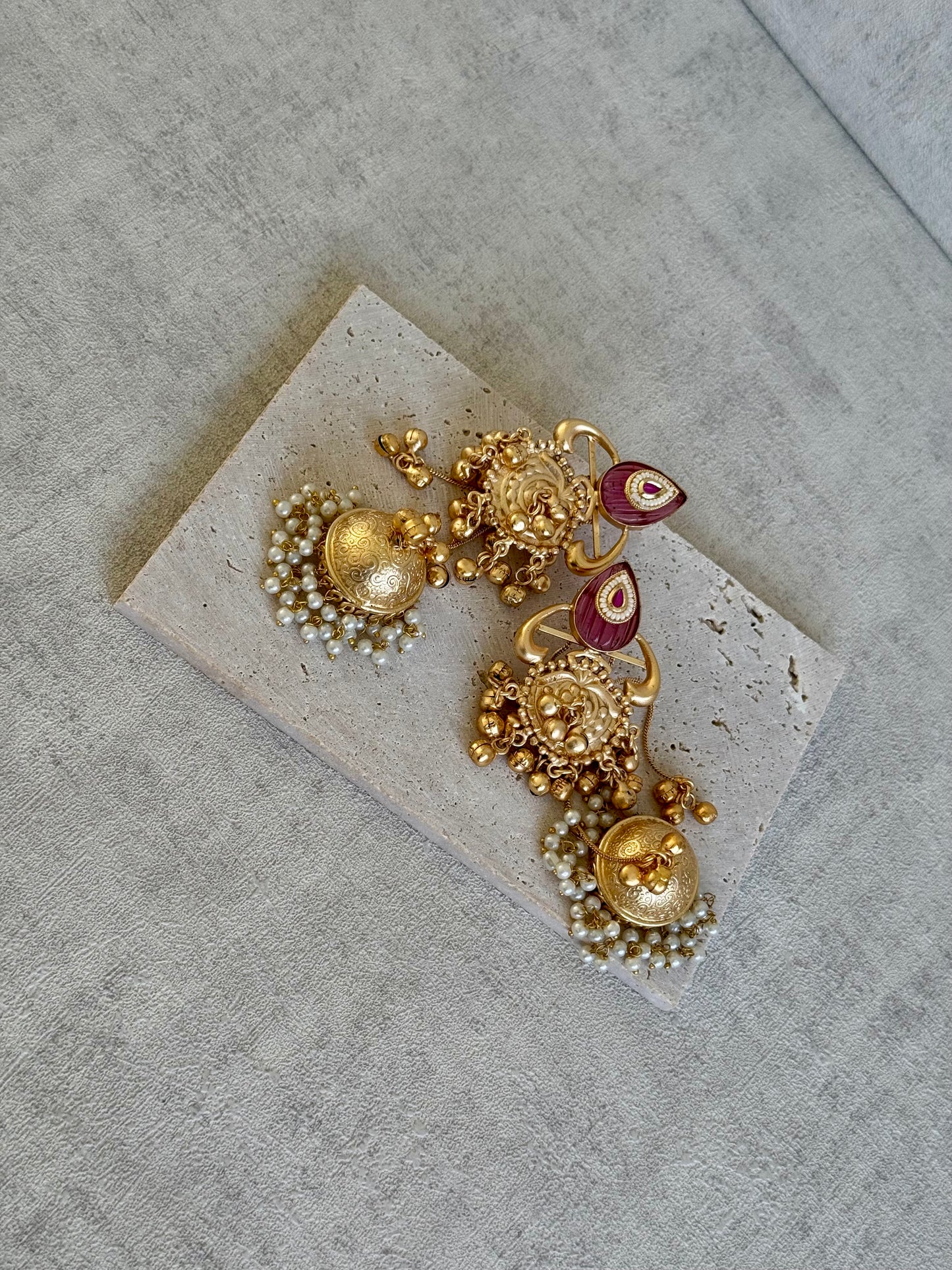 Ayura Designs Prisha Earrings – Antique Gold Jhumkas with Ruby Red Studs, Pearl Detailing & Long Dangling Chains