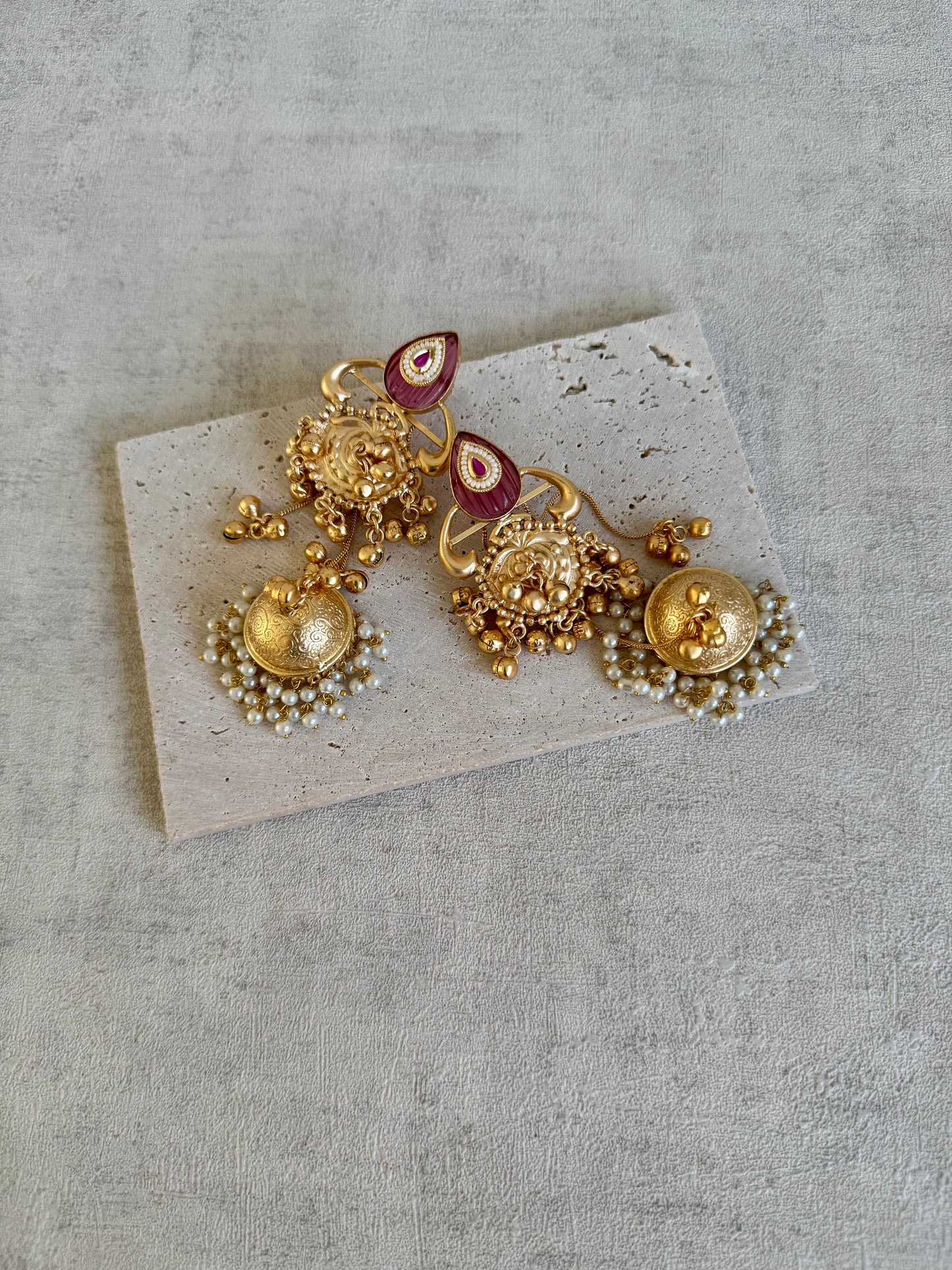 Ayura Designs Prisha Earrings – Antique Gold Jhumkas with Ruby Red Studs, Pearl Detailing & Long Dangling Chains