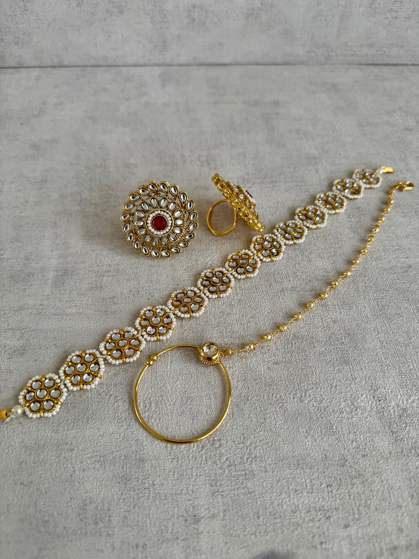 Ayura Designs Gulbadan Bridal Set with Necklace, Jhumkis, Tikka, Nath, Ring & Sheeshphool – Jadau Kundan Craftsmanship with Mirror-Cut Polki, Ruby Red Stones & Antique Gold Finish