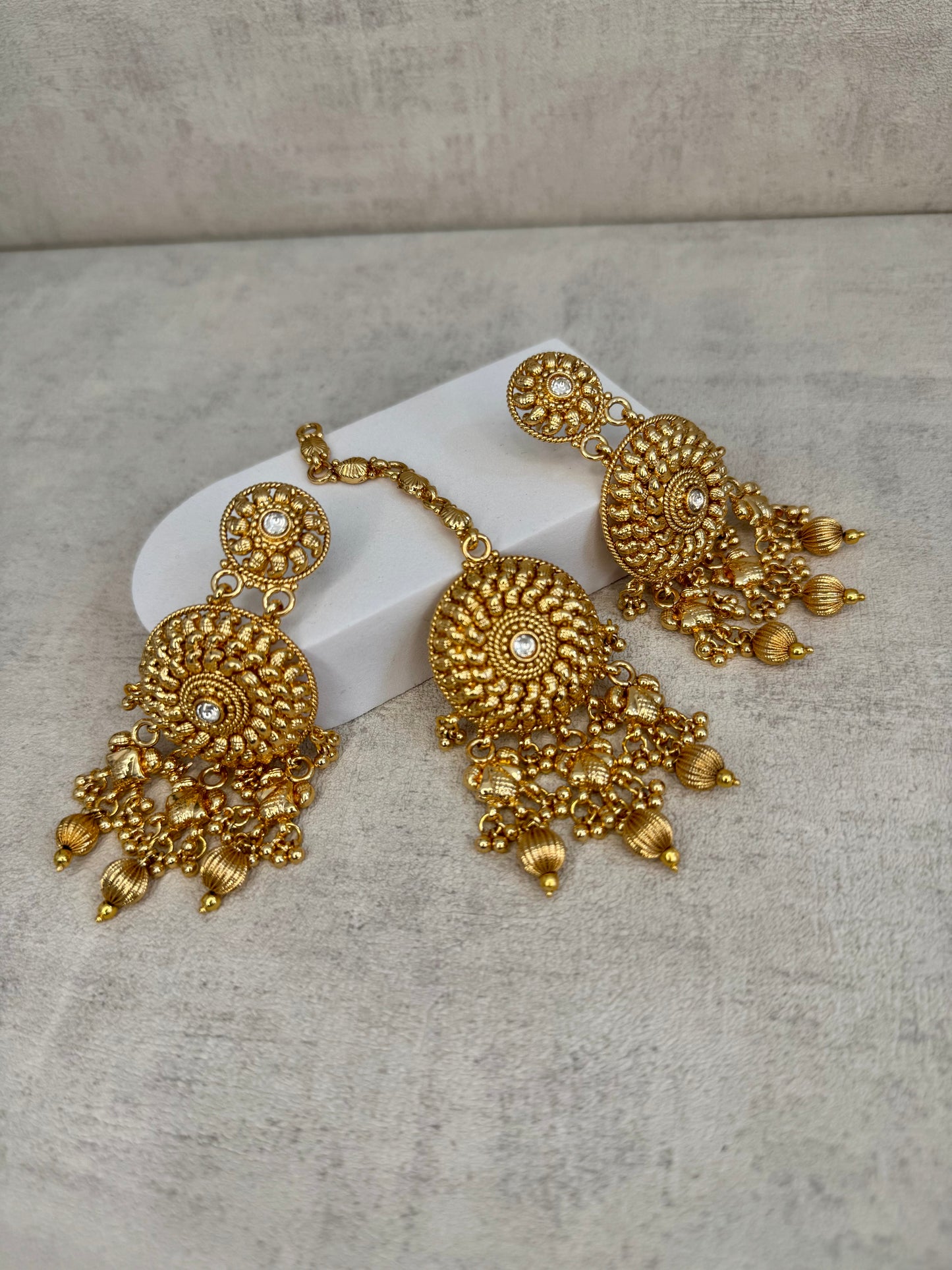 Ayura Designs Hoor Tikka & Earrings – Opulent Gold Adornment with Emerald Green, Pink and White Beads