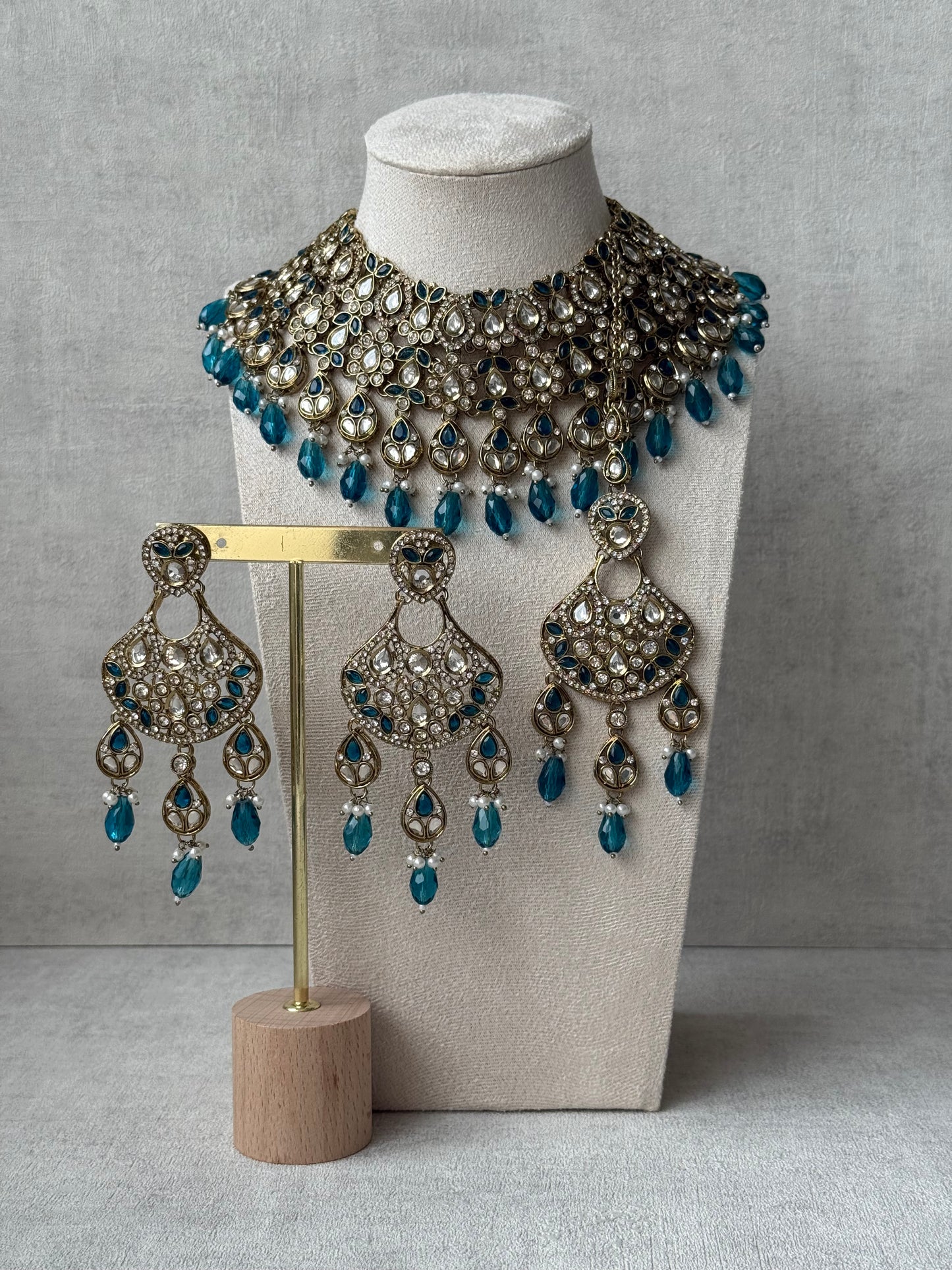 Ayura Designs Hoorain Set with Earrings – Antique Gold Finish, Mirror-Cut Stones & Peacock Blue Beads