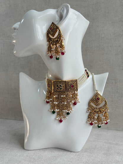 Ayura Designs Samera Choker Set with Earrings & Tikka – Rani Pink & Emerald Green Beads, Pearl Detailing, Green Centre Stone, Floral Motifs & Antique Gold Finish