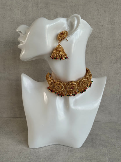Ayura Designs Nooriya Choker Set with Jhumkis & Tikka – Antique Gold with Ruby, Emerald & Pearl Detailing