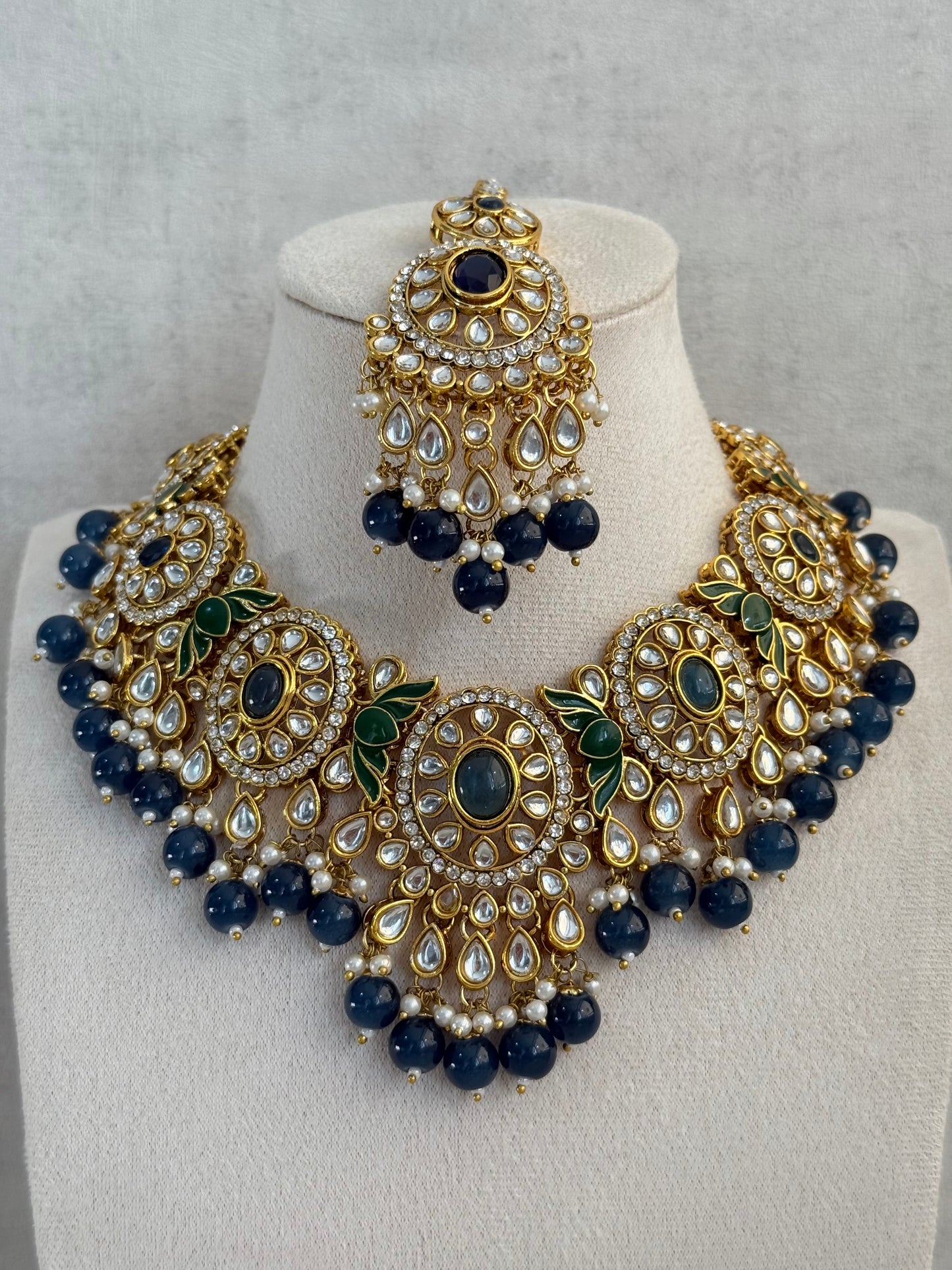 Ayura Designs Zara Set with Necklace, Earrings, Tikka & Passa – Antique Gold with Kundan Detailing & Ink Blue Stones & Beads