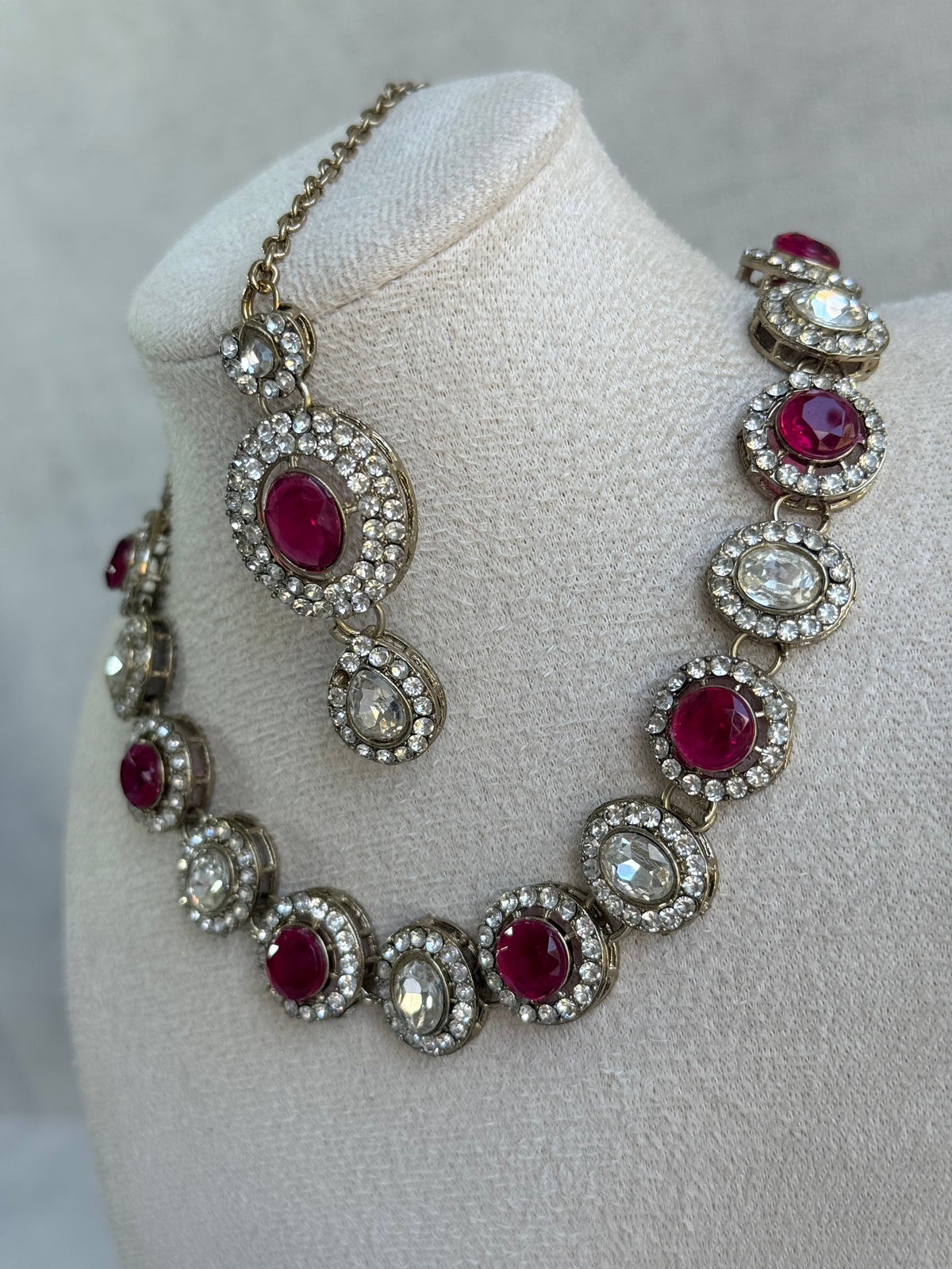 Ayura Designs Eira Necklace Set with Earrings & Tikka – Rani Pink & Crystal Stones with Antique Gold Finish