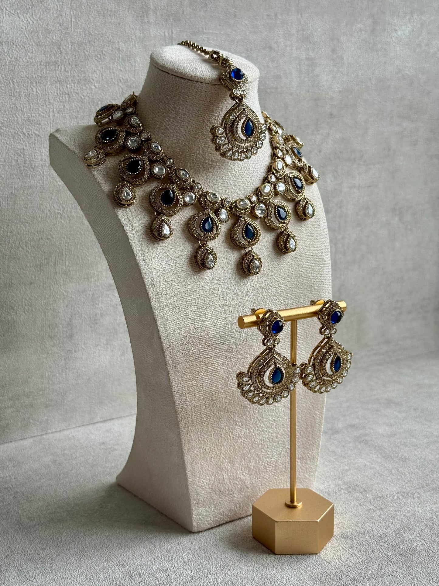 Ayura Designs Sahira Set – Necklace, Earrings & Tikka with Sapphire Blue Stones, Mirror-Cut Detailing & Antique Gold Finish
