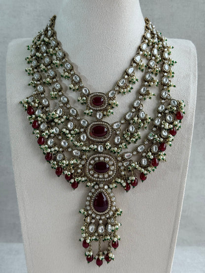 Ayura Designs Sahra Bridal Set with Earrings & Tikka – Ruby Red, Kundan Stones, Pearls & Emerald Green Accents in Antique Gold Finish