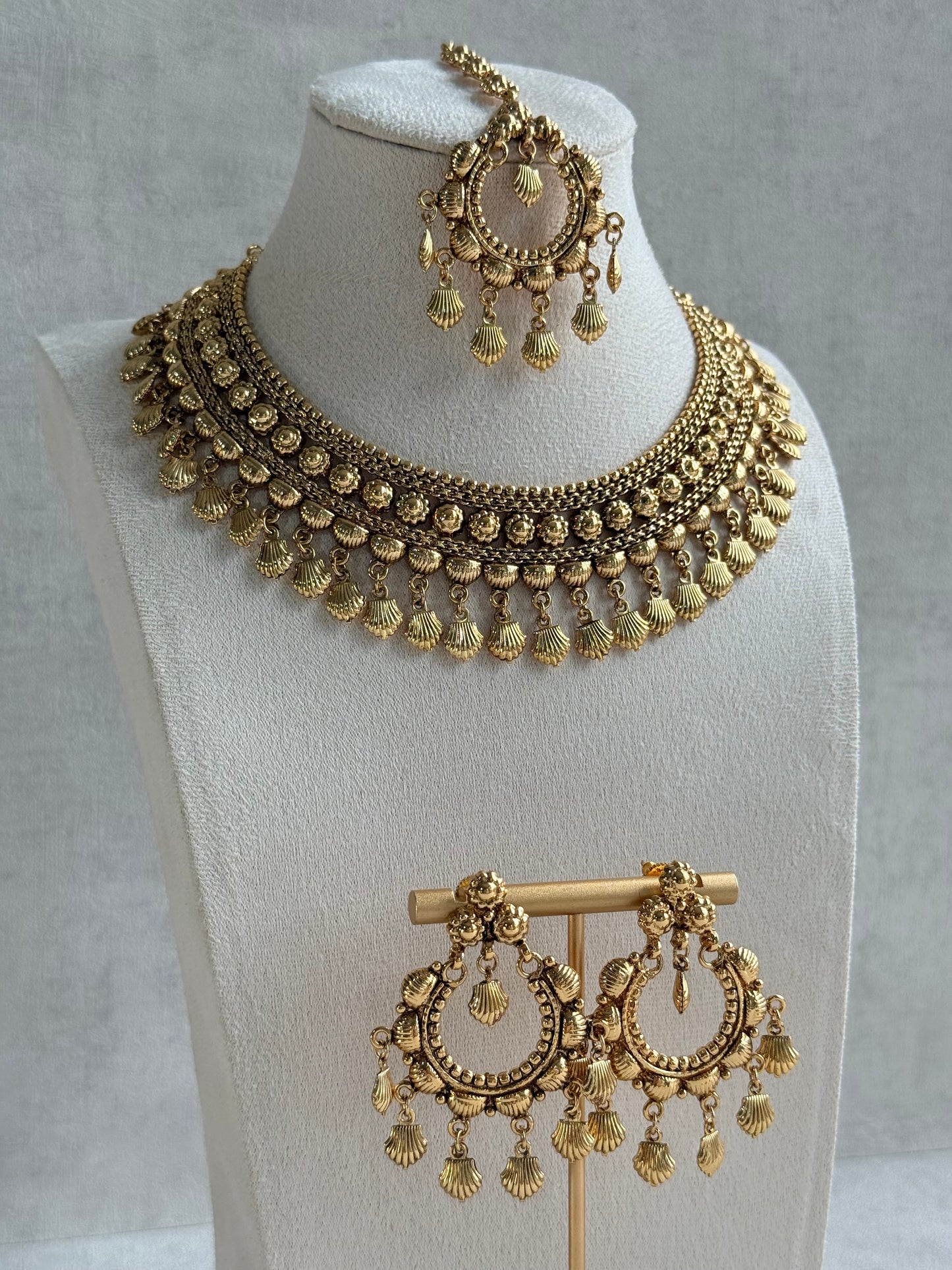 Ayura Designs Falaq Necklace Set with Earrings & Tikka – Gold Finish with Layered Chain, Floral & Shell Drop Detailing