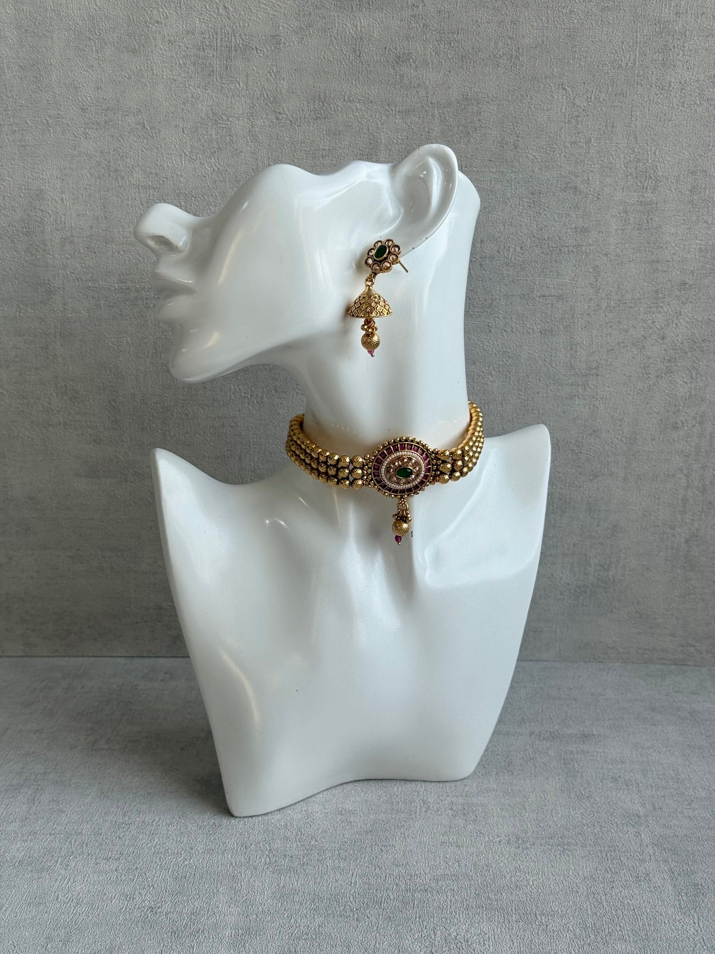 Ayura Designs Kavish Choker Set – Antique Gold Choker with Jhumkis in Rani Pink & Emerald Green with Pearl Detailing