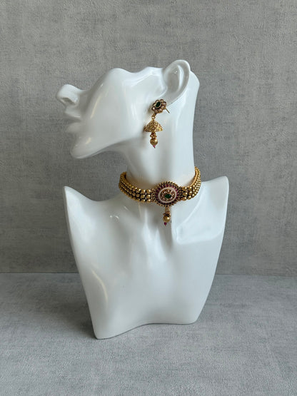 Ayura Designs Kavish Choker Set – Antique Gold Choker with Jhumkis in Rani Pink & Emerald Green with Pearl Detailing