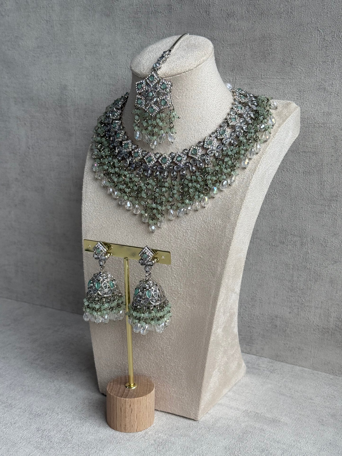 Ayura Designs Rayna Set – Necklace, Jhumkis & Tikka with Mint Green Beads, Mirror-Cut Stones & Silver Finish