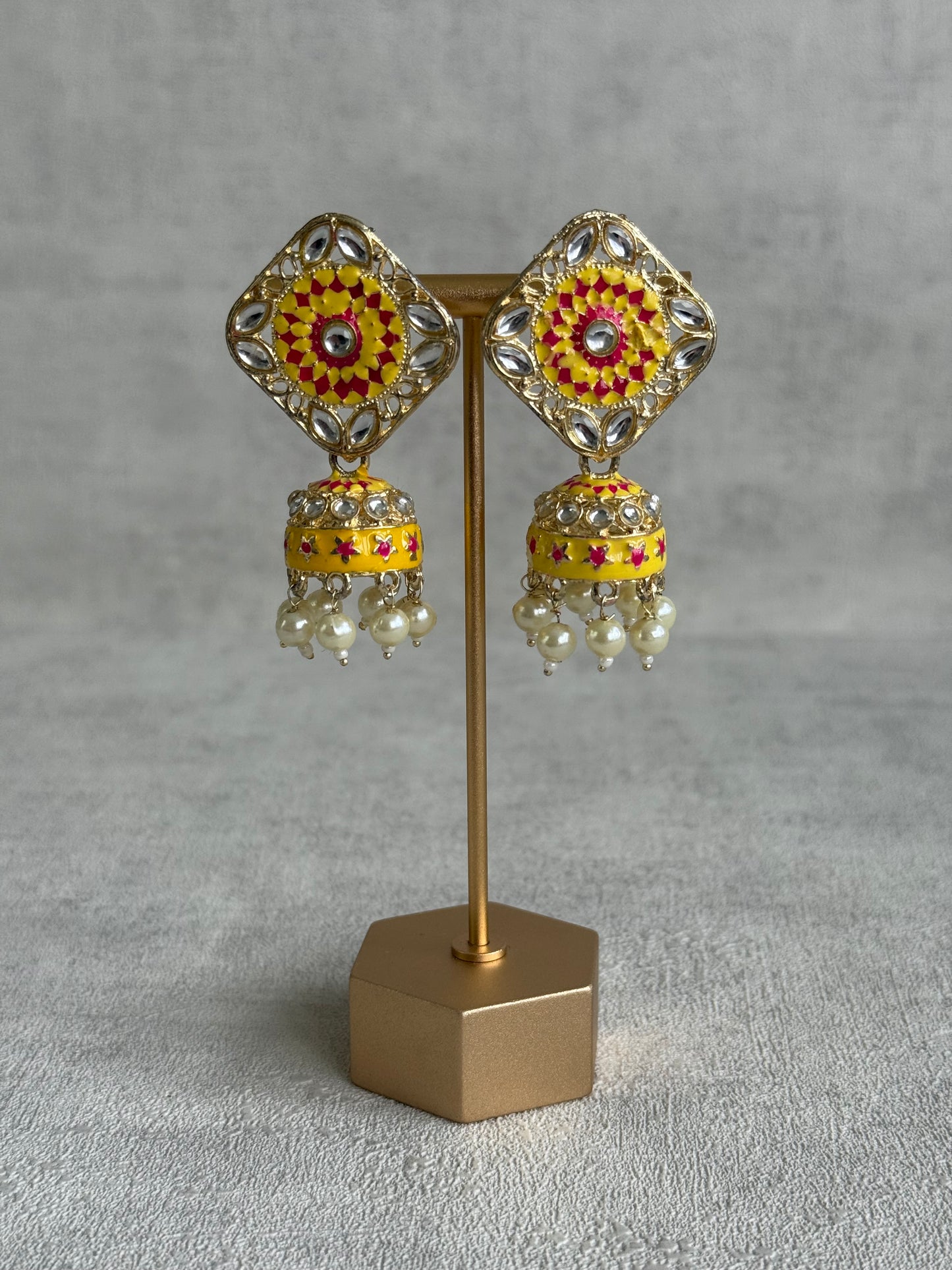 Ayura Designs Rangoli Jhumkis – Marigold Yellow & Hot Pink Meenakari with Pearl Drops in Antique Gold Finish