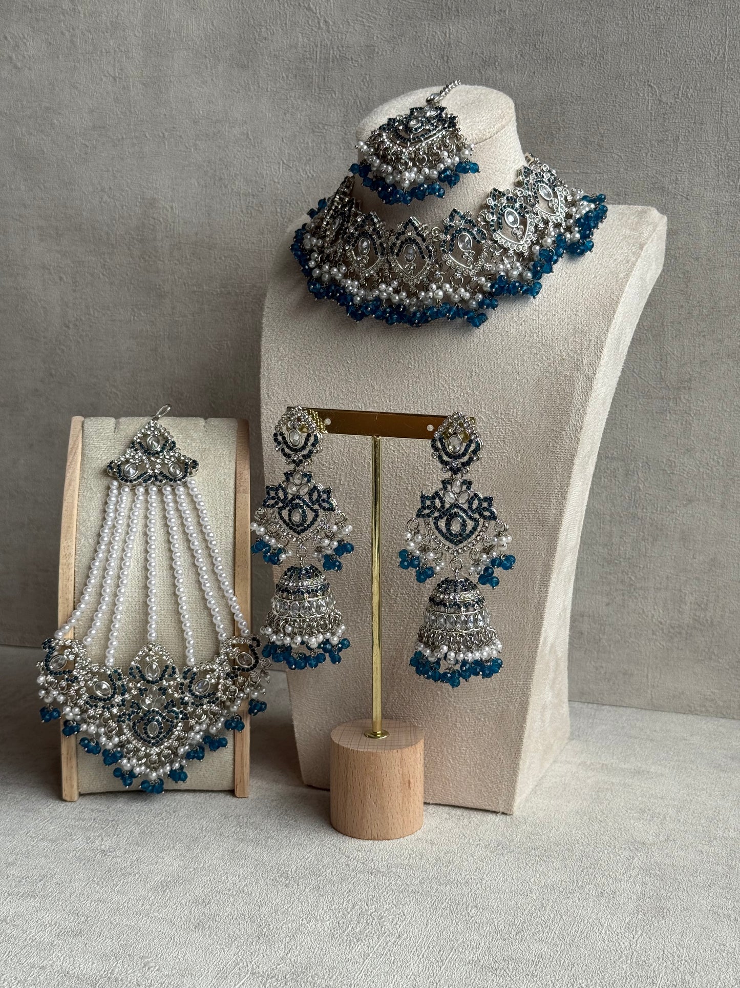 Ayura Designs Wania Set with Jhumkis, Tikka & Passa – Peacock Blue Beads, Mirror-Cut Stones & Antique Silver Finish