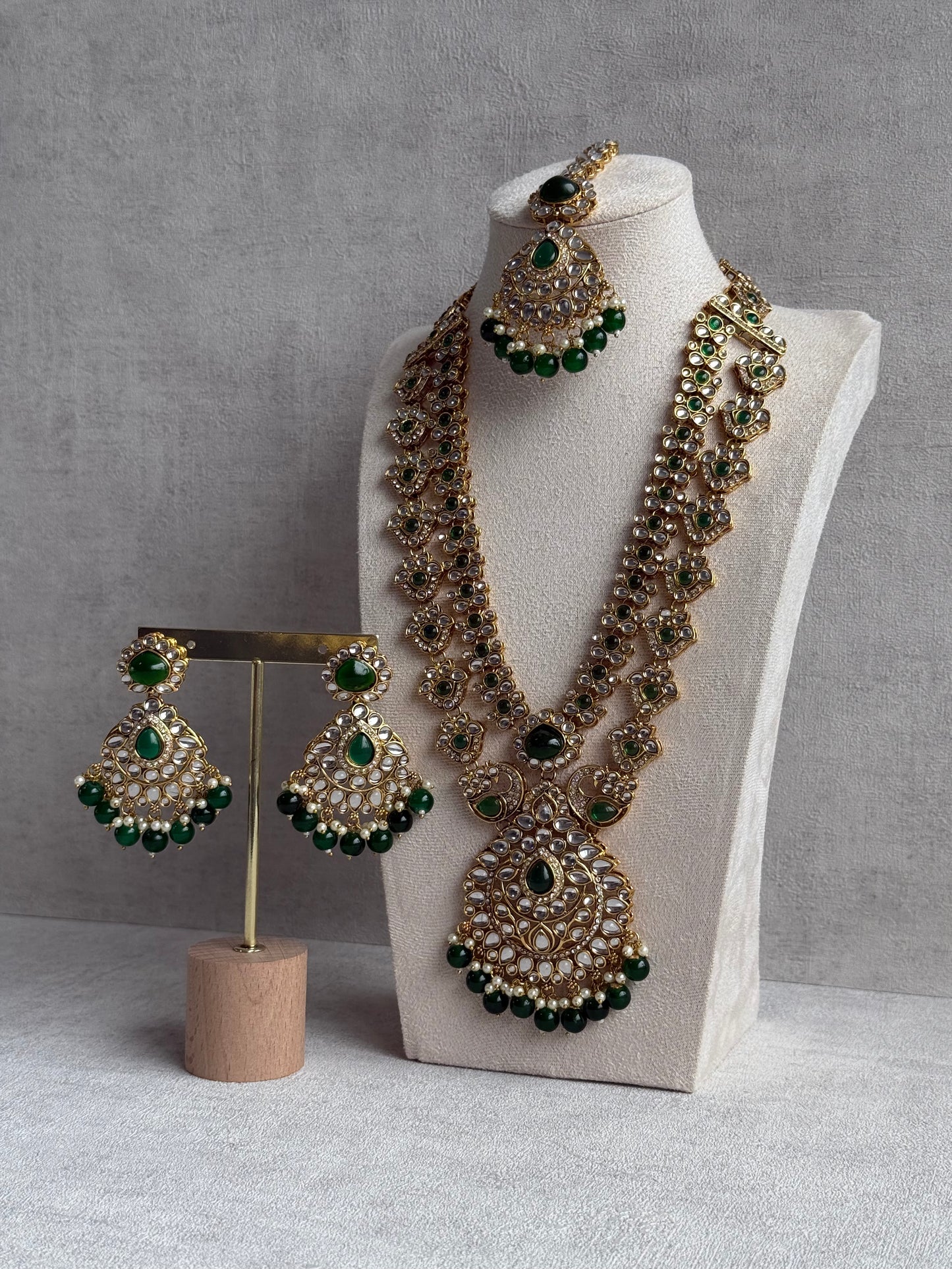 Ayura Designs Javeria Set with Earrings & Tikka – Emerald Green Stones, Mirror Kundan & Gold Finish