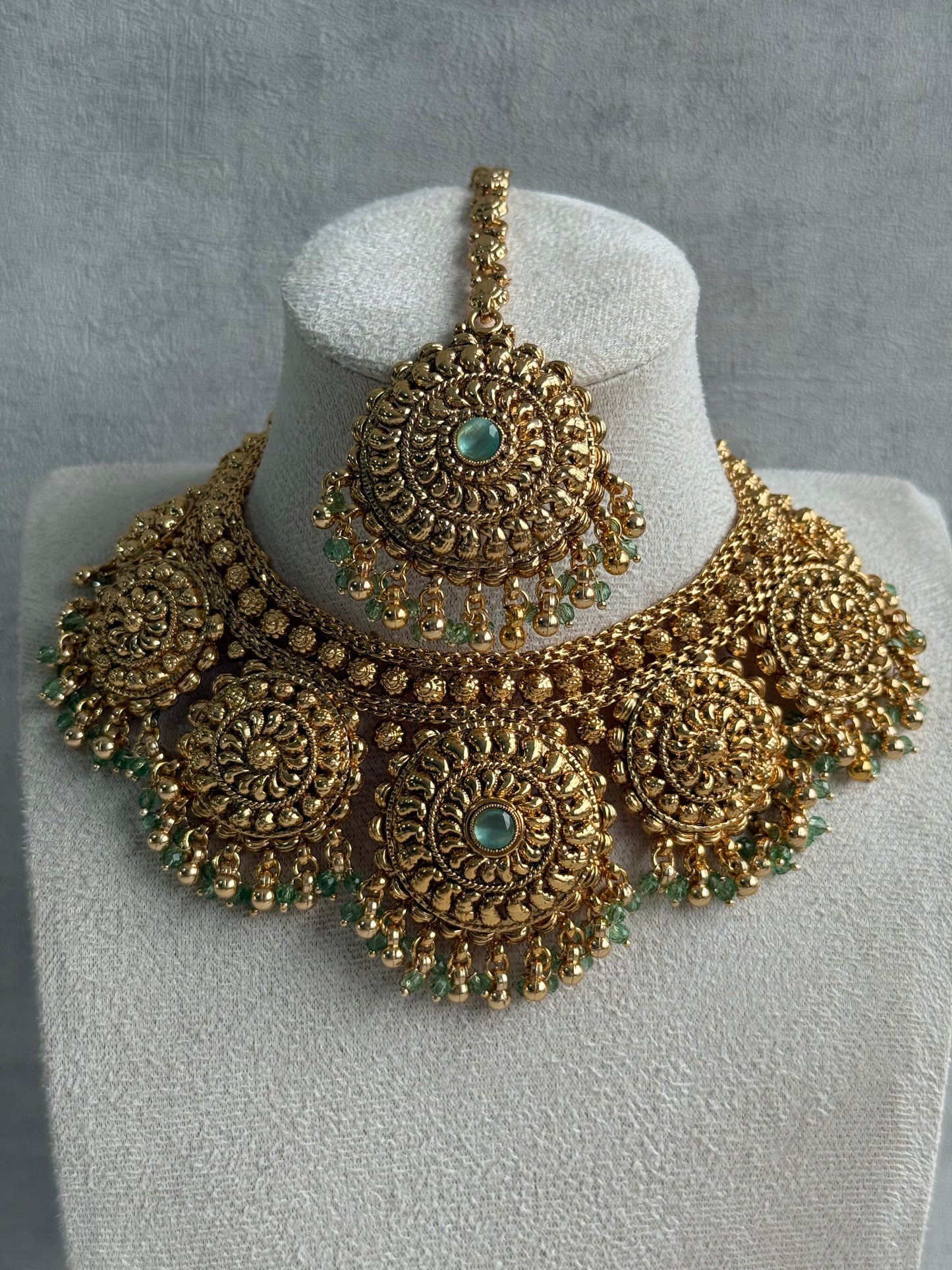 Ayura Designs Rummy Set – Statement Necklace, Earrings & Tikka with Pistachio Green Beads and Polished Gold Finish
