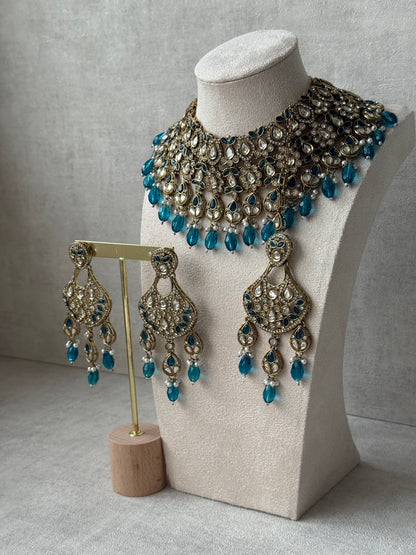 Ayura Designs Hoorain Set with Earrings – Antique Gold Finish, Mirror-Cut Stones & Peacock Blue Beads