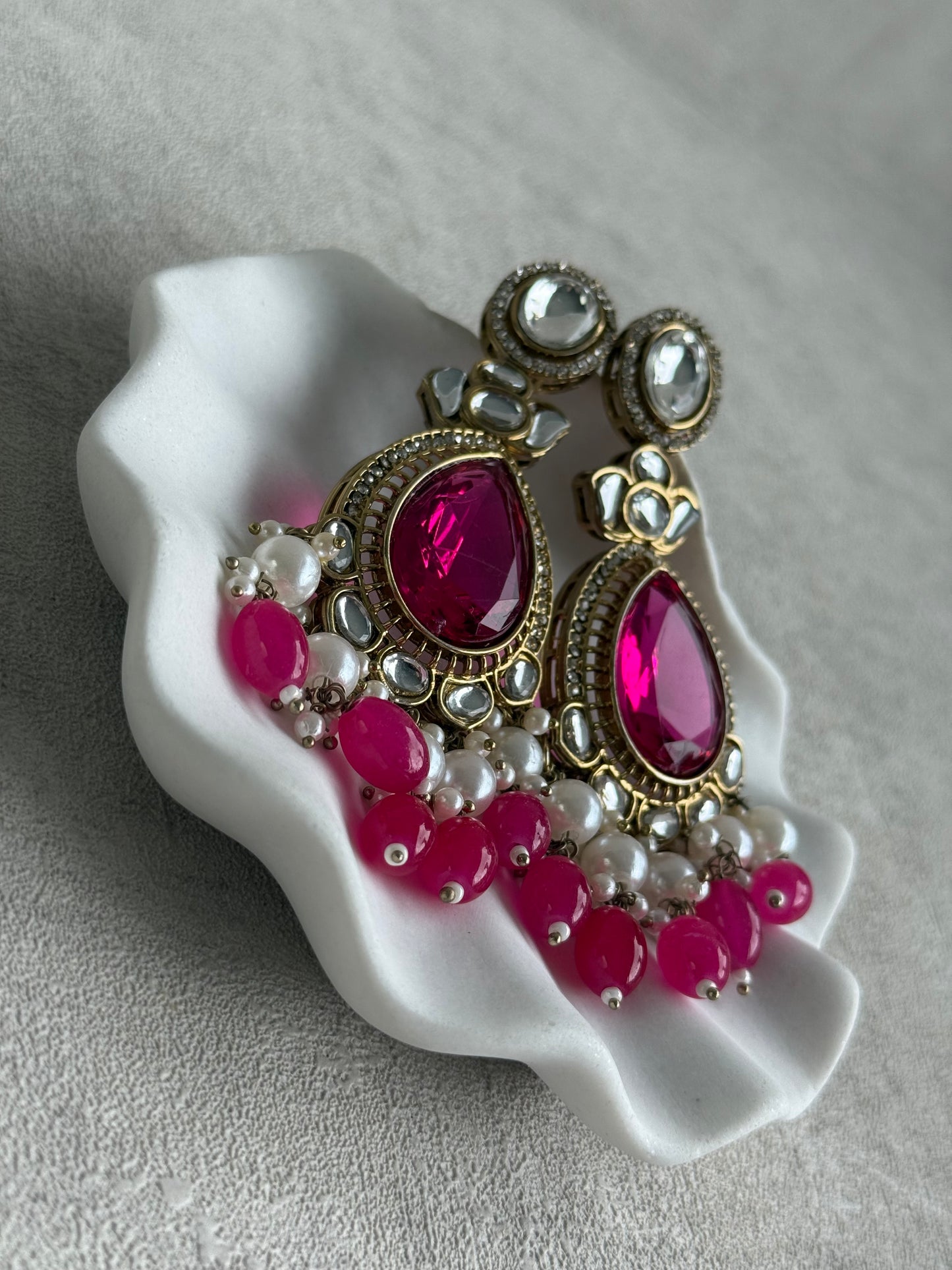 Ayura Designs Nageen Earrings – Antique Gold Jhumkis with Hot Pink Stones, Mirror-Cut Accents & Pearl Drops