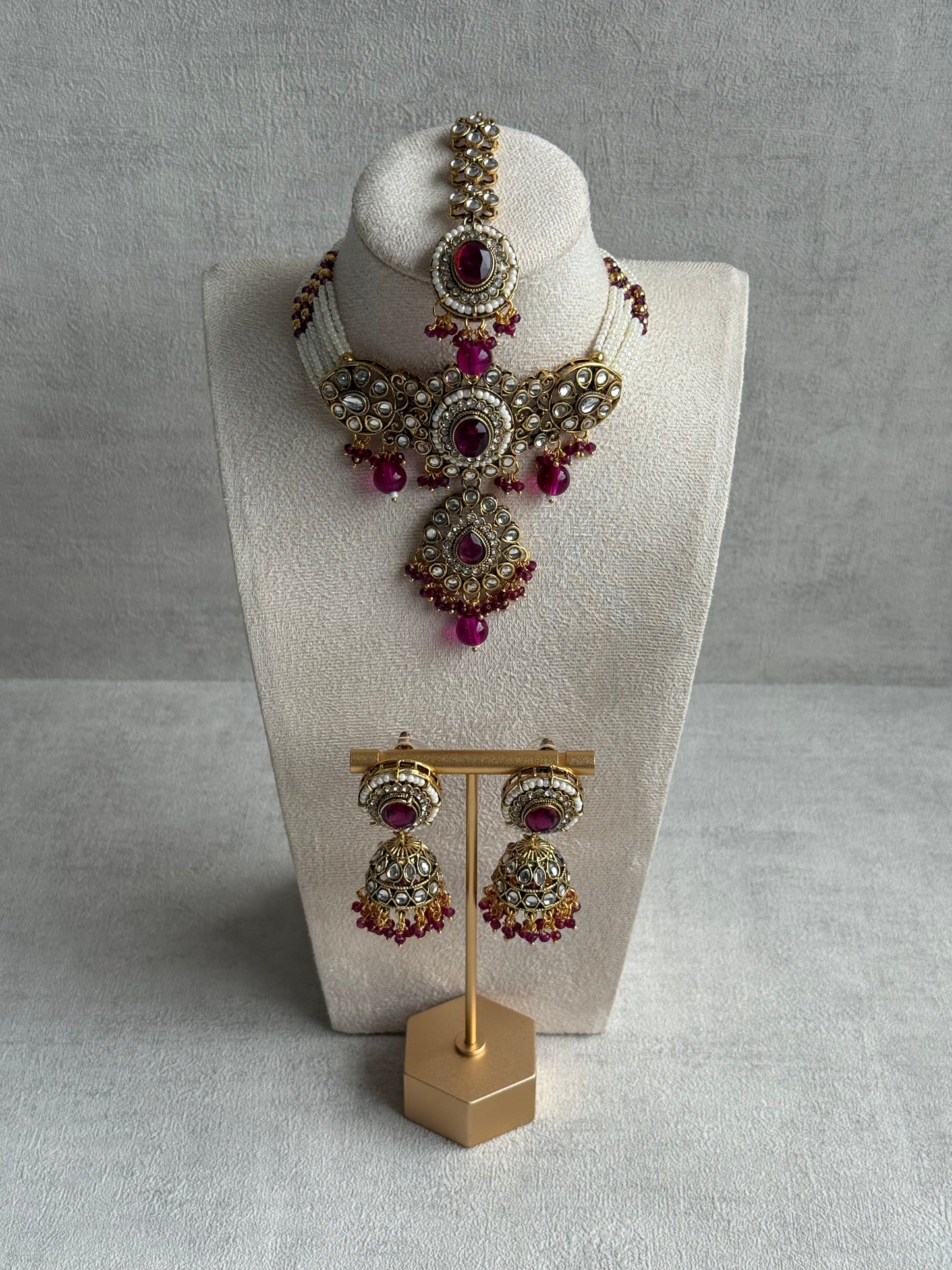 Ayura Designs Muskaan Set – Choker, Jhumkis & Tikka with Magenta Beads, Kundan Stones & Antique Gold Finish