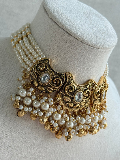 Ayura Designs Sneha Choker Set with Earrings & Tikka – Ivory Beads, Layered Pearl Detailing, Ghungroos & Antique Gold Finish