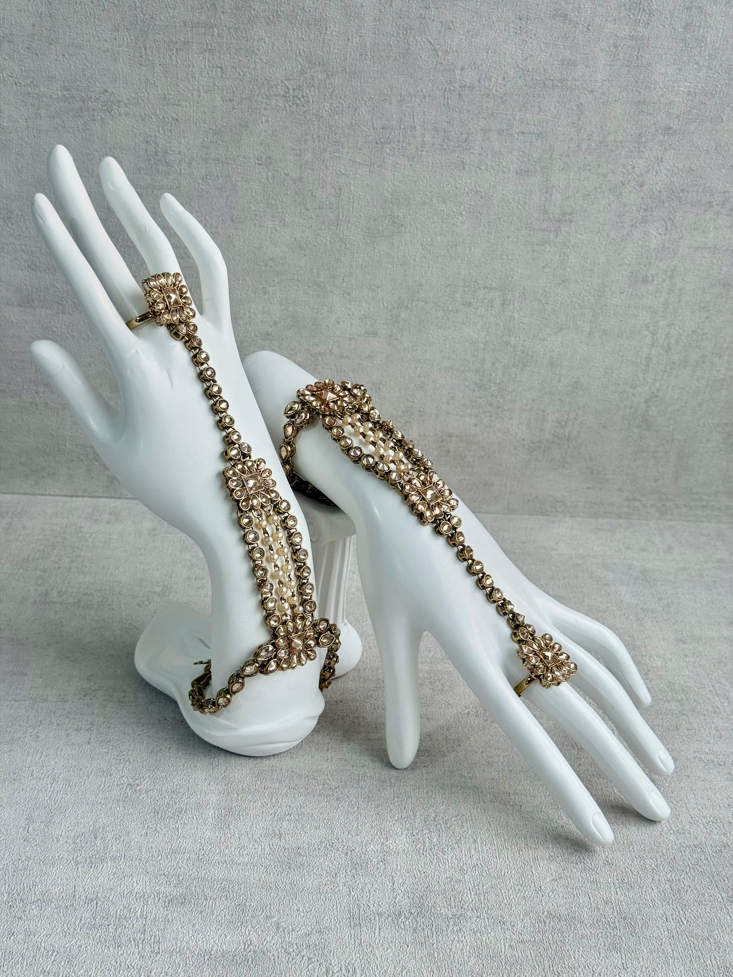 Ayura Designs Rupi Haathphool – Antique Gold with Champagne Stones & Pearl Detailing