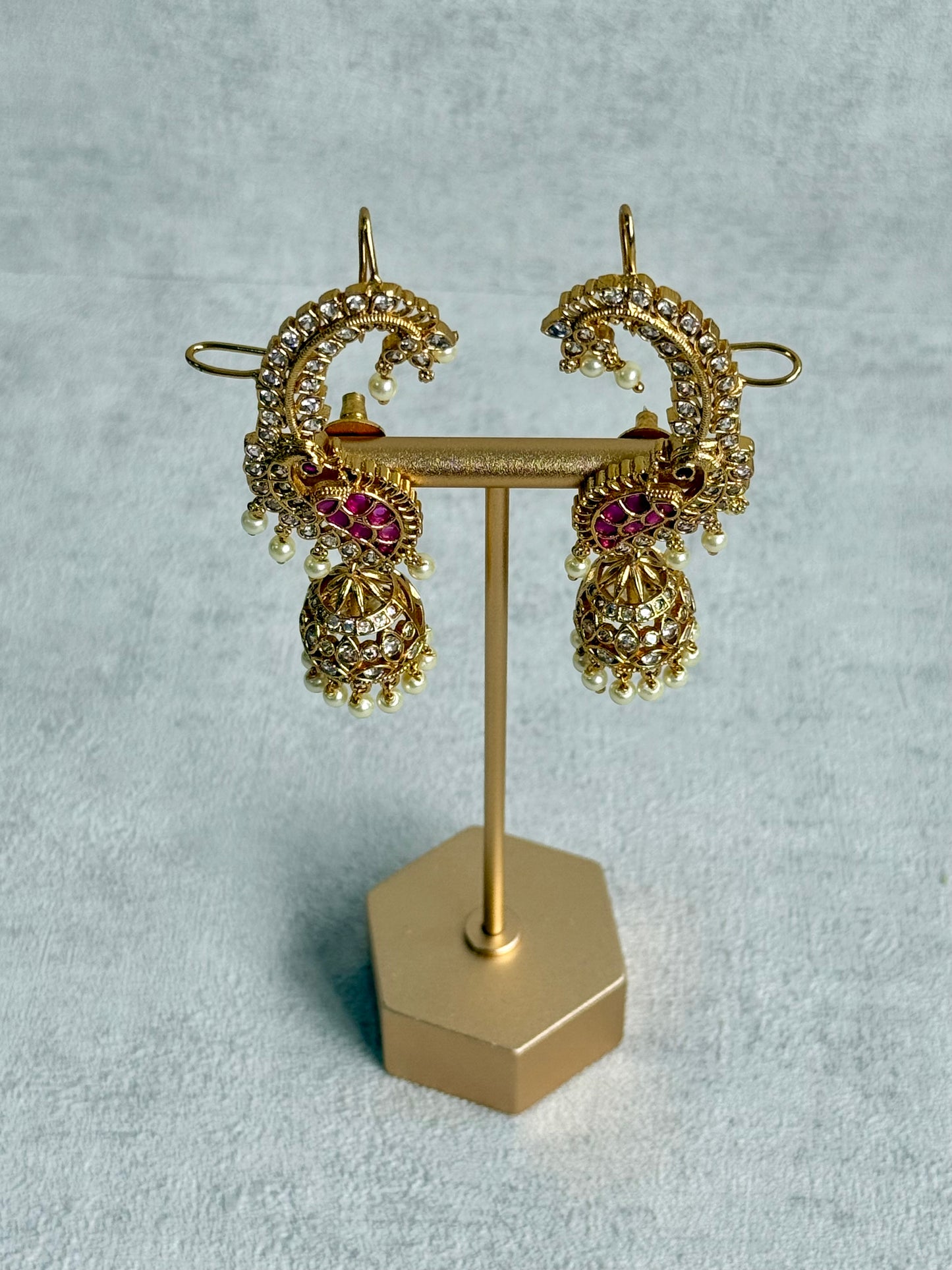Ayura Designs Padma Earrings – Gold Half Ear Cuffs with Peacock Motif, Pink Stone Accents, Kundan Crystals & Pearl Jhumka Drops