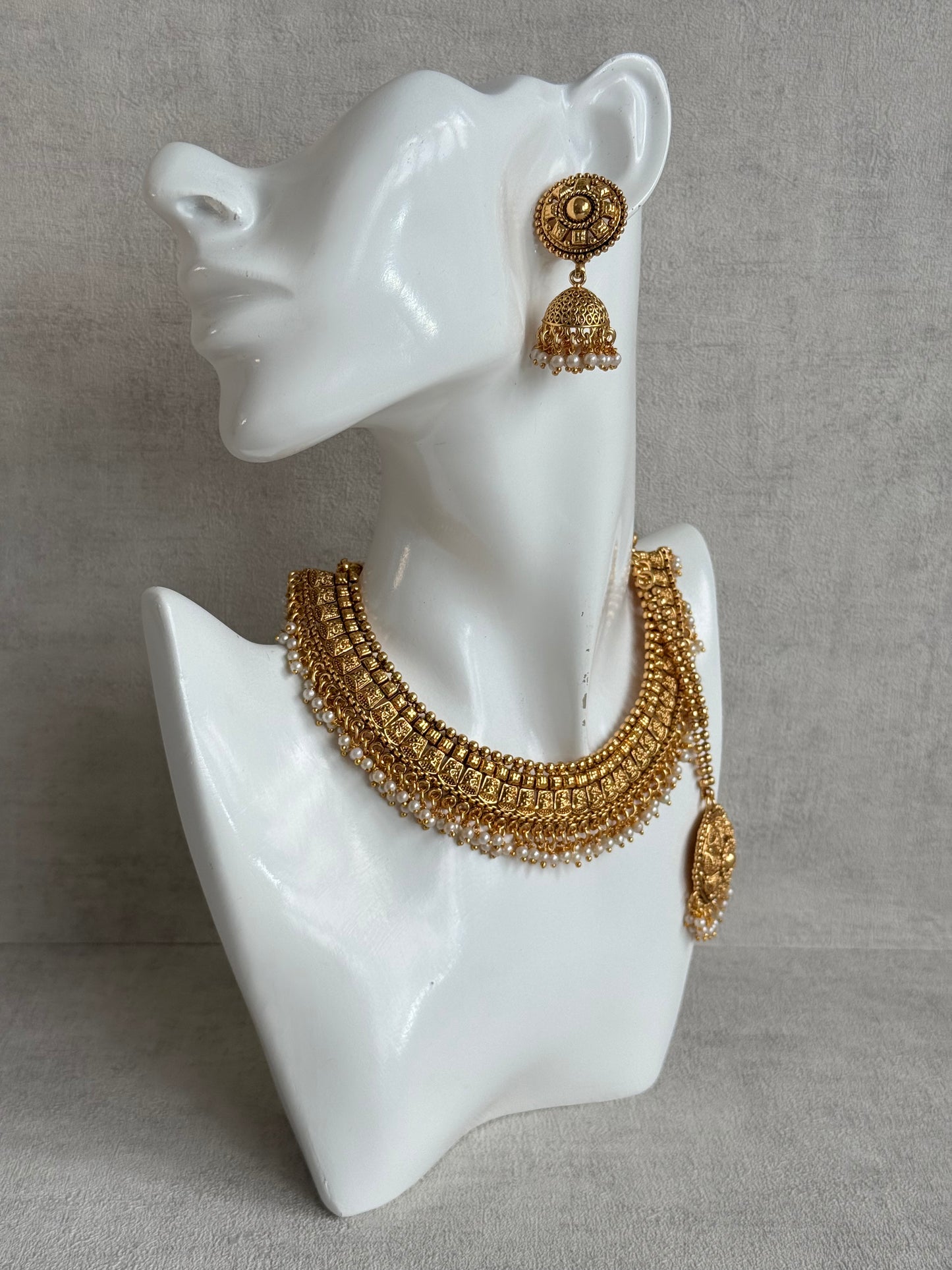 Ayura Designs Iksirat Necklace Set with Jhumkis & Tikka – Gold Heritage Design with Pearl Detailing