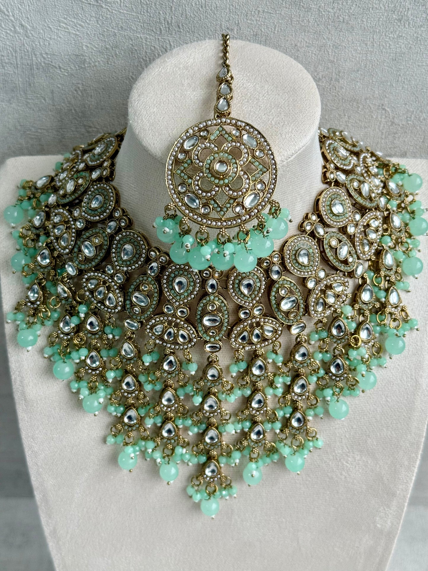 Ayura is Designs Tanya Bridal Set with Necklace, Earrings & Tikka – Pistachio Mint Beads, Mirror-Cut Stones and Antique Gold Finish