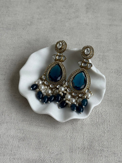 Ayura Designs Nageen Earrings – Antique Gold Jhumkis with Ink Blue Stones, Mirror-Cut Detailing & Pearl Drops