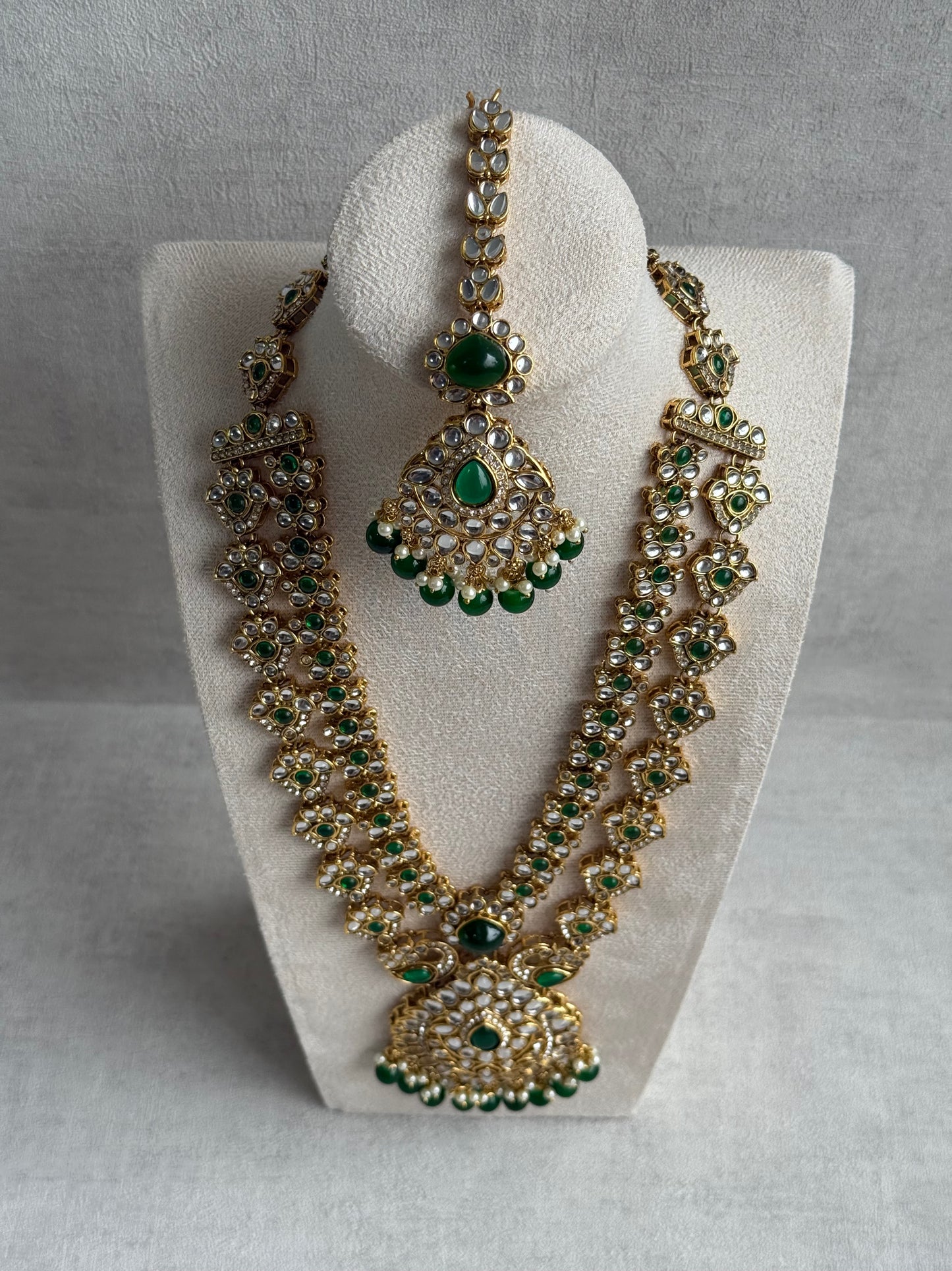 Ayura Designs Javeria Set with Earrings & Tikka – Emerald Green Stones, Mirror Kundan & Gold Finish